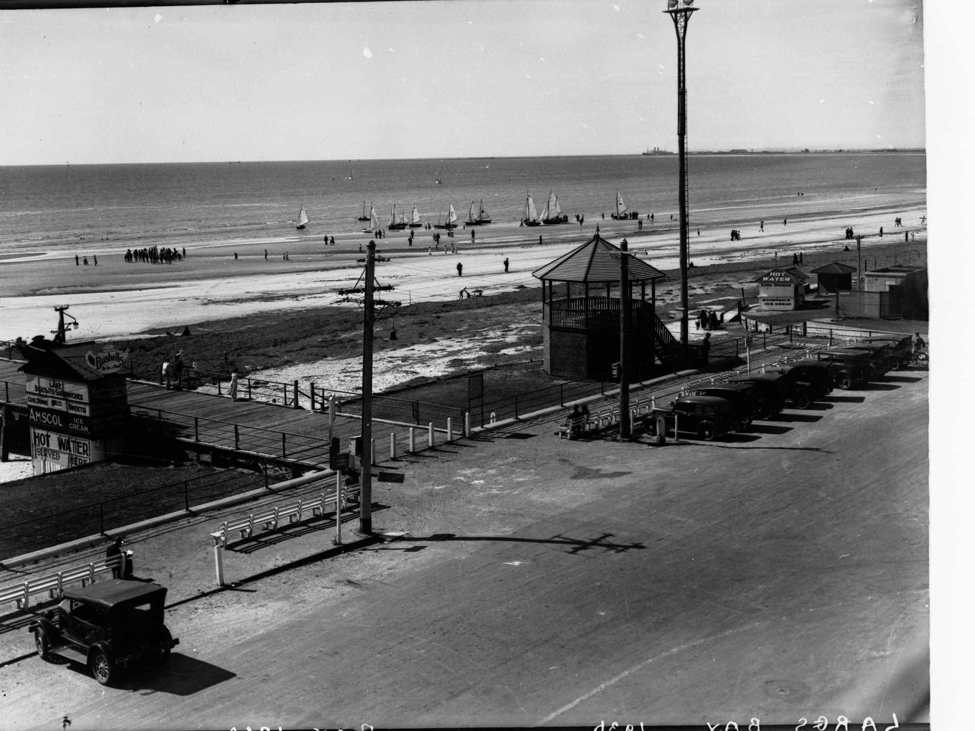 Largs Bay showing jetty and automobile in carpark