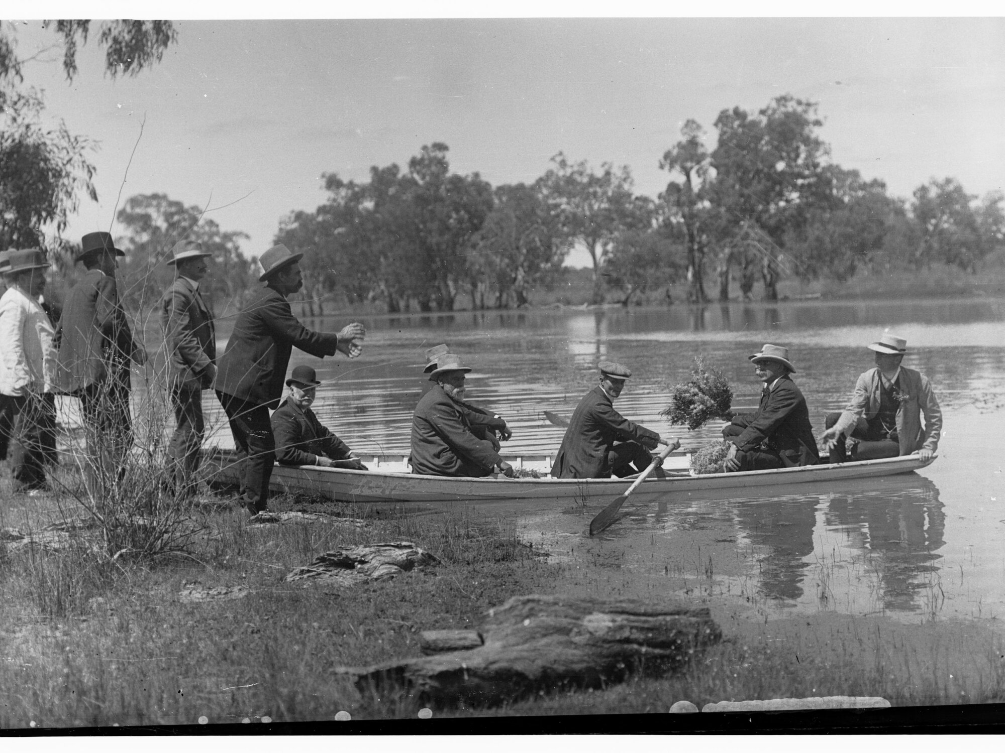 Men in Rowboat at Cobdogla - Parliamentary Tour on River Murray