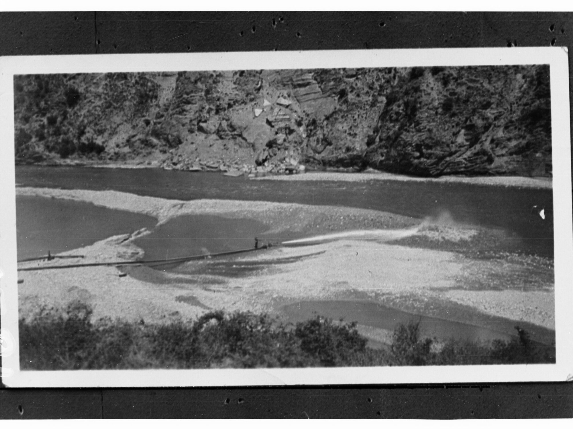 View of River Passing Through Mountain Range