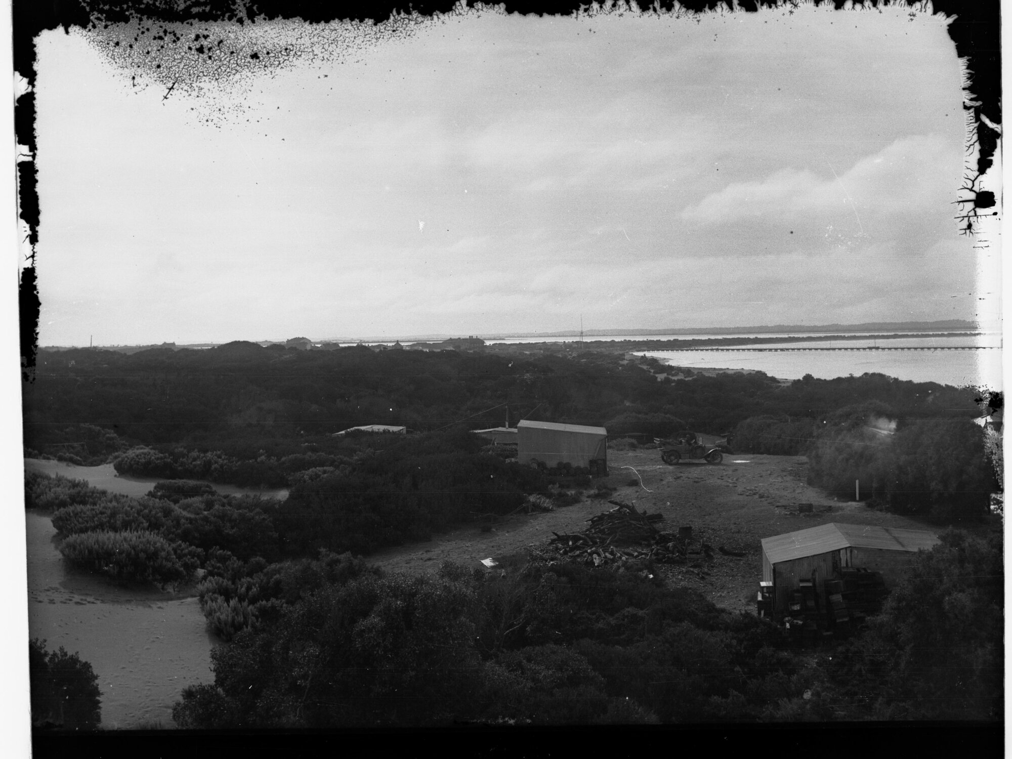 Beachport View Showing Automobiles and Sheds