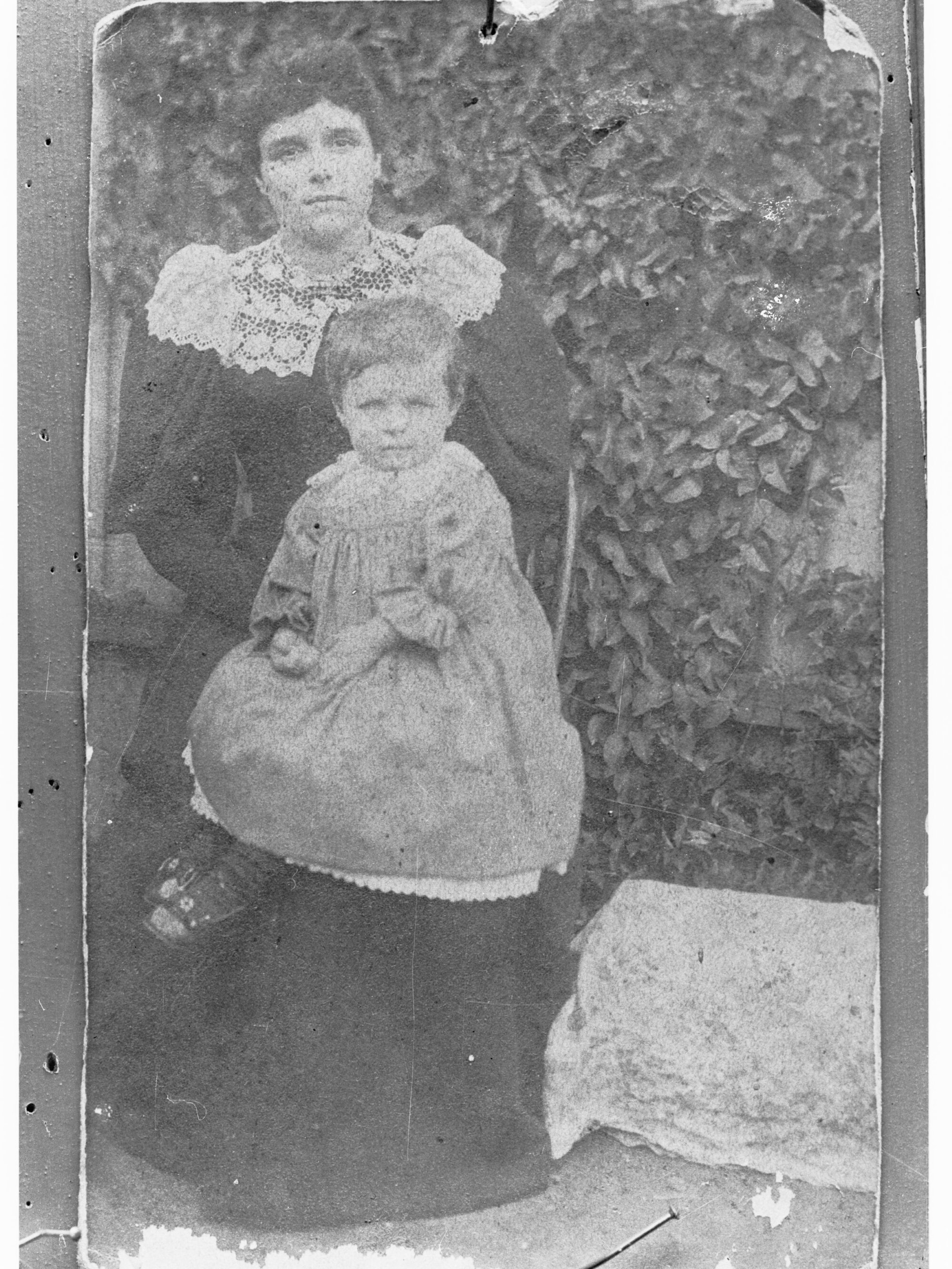 Mrs D M Bates and her baby - copied 1920