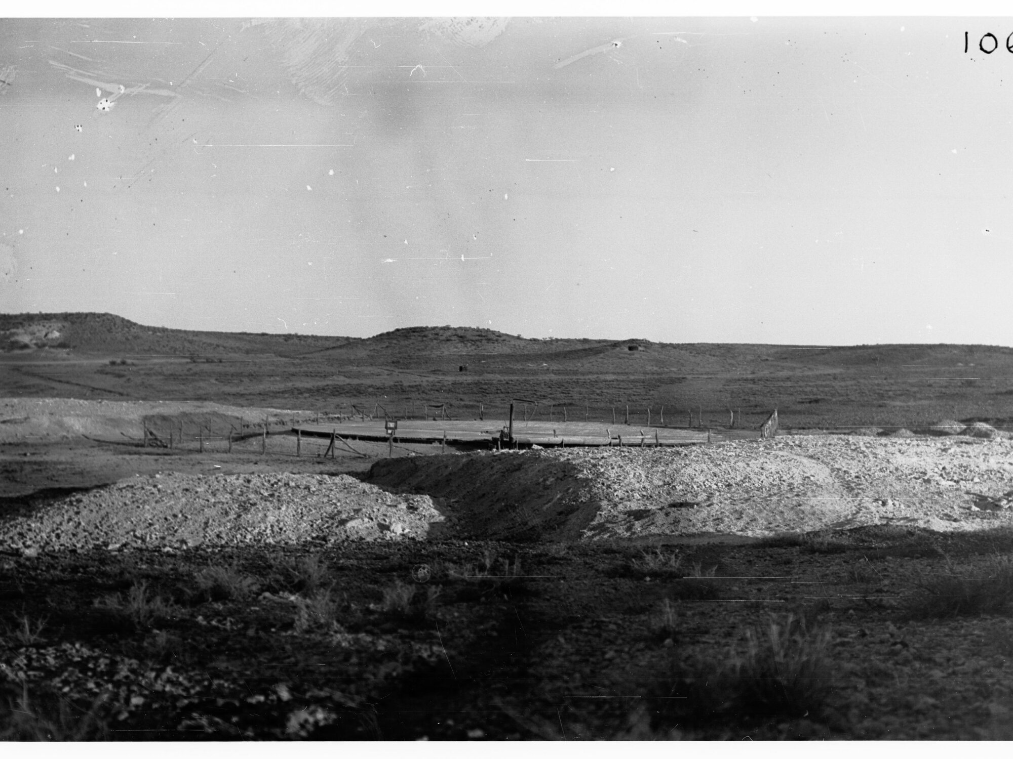 Parliamentary party on tour of Far North in Austin cars (government cars) - shows small mine, possibly Oodnadatta
