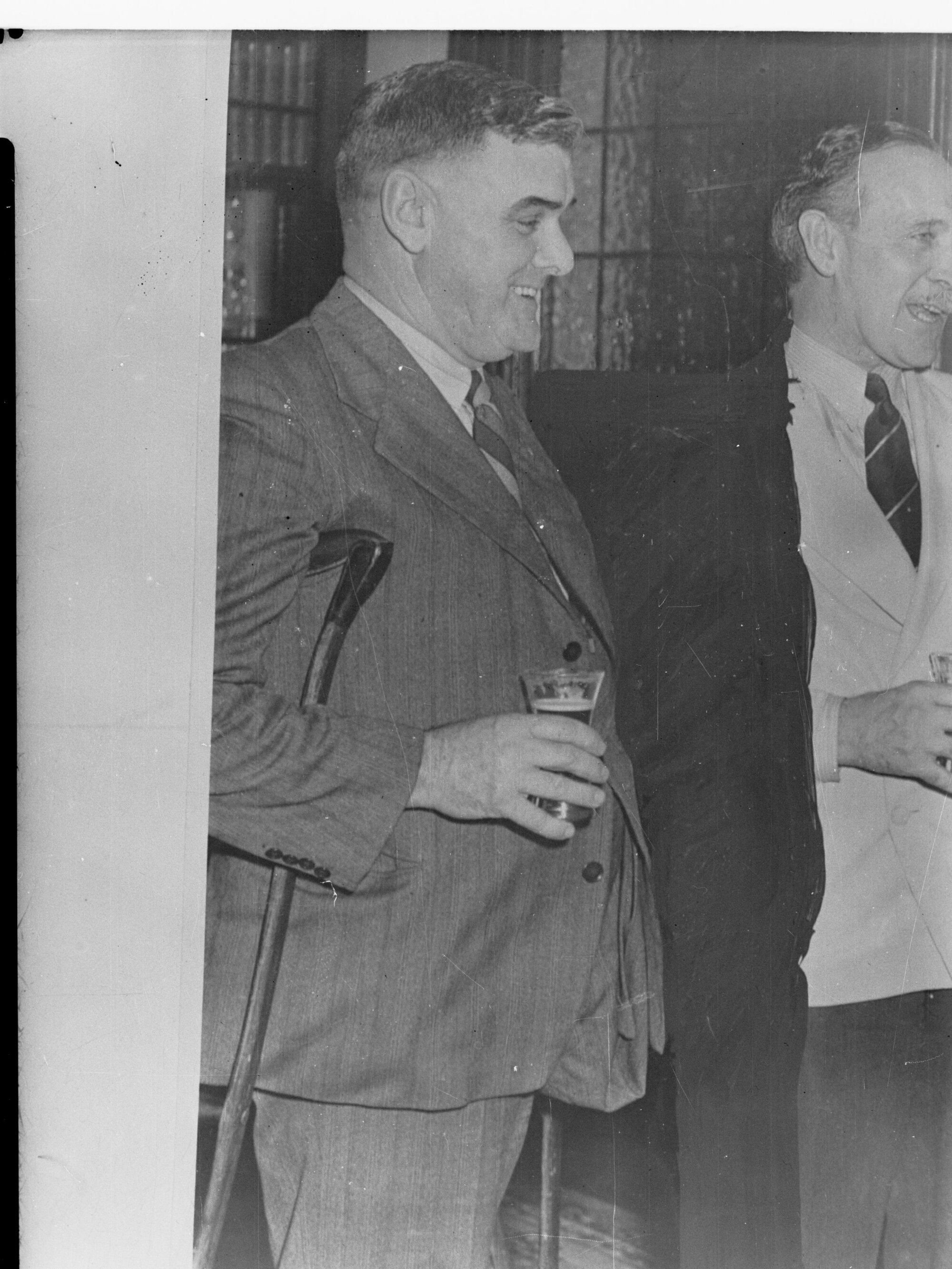 Two men holding beers