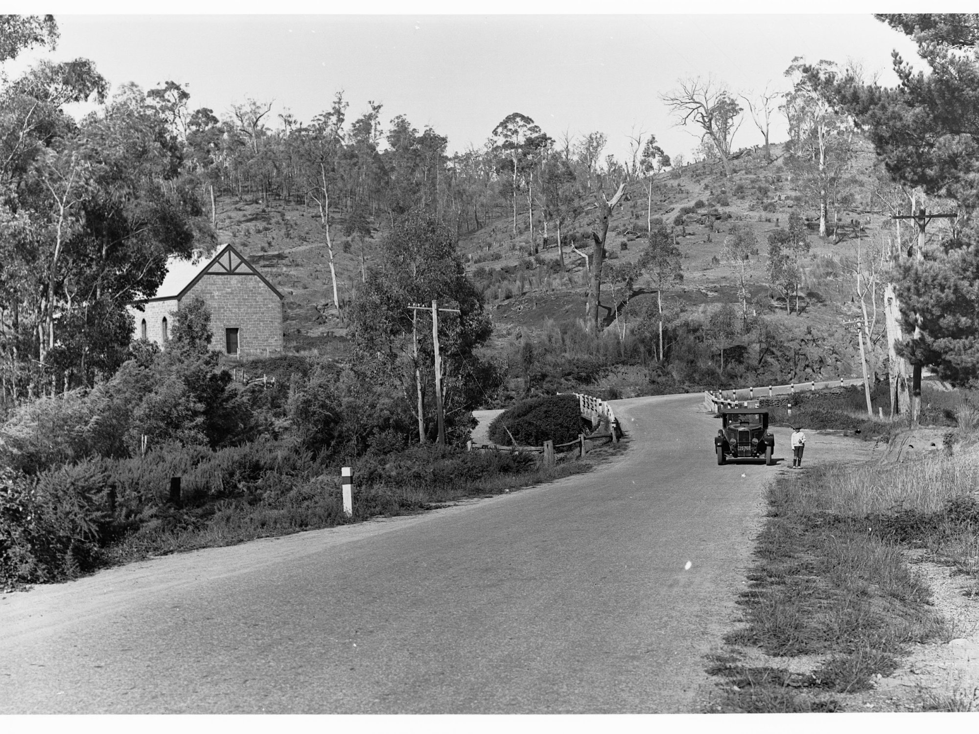Automobile on road by Anglican Mission Hall at Stony Creek near Forest Range