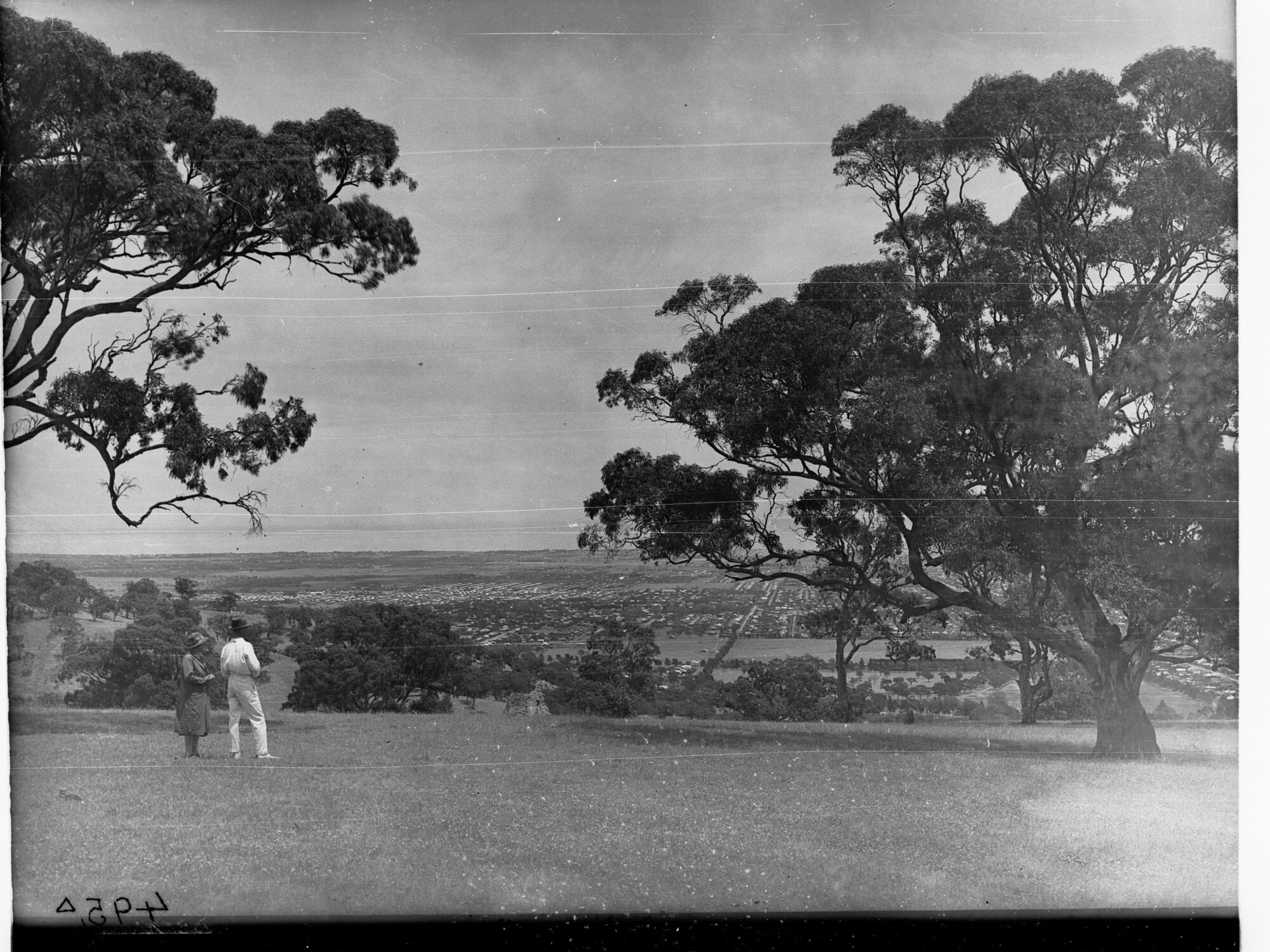 Man and a Woman Standing on Mount Osmond Looking Over City