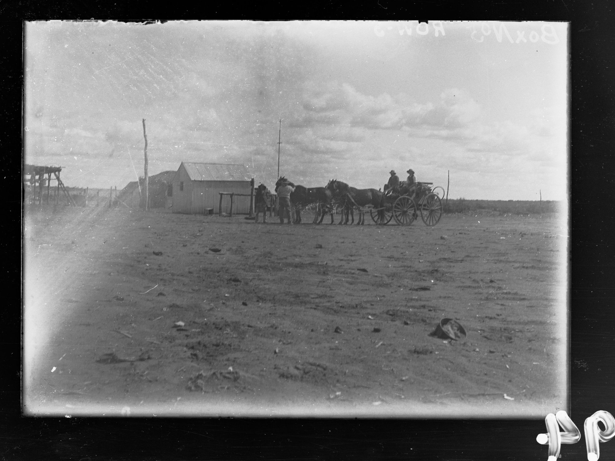 View of men, horses and wagon, East-West railway line