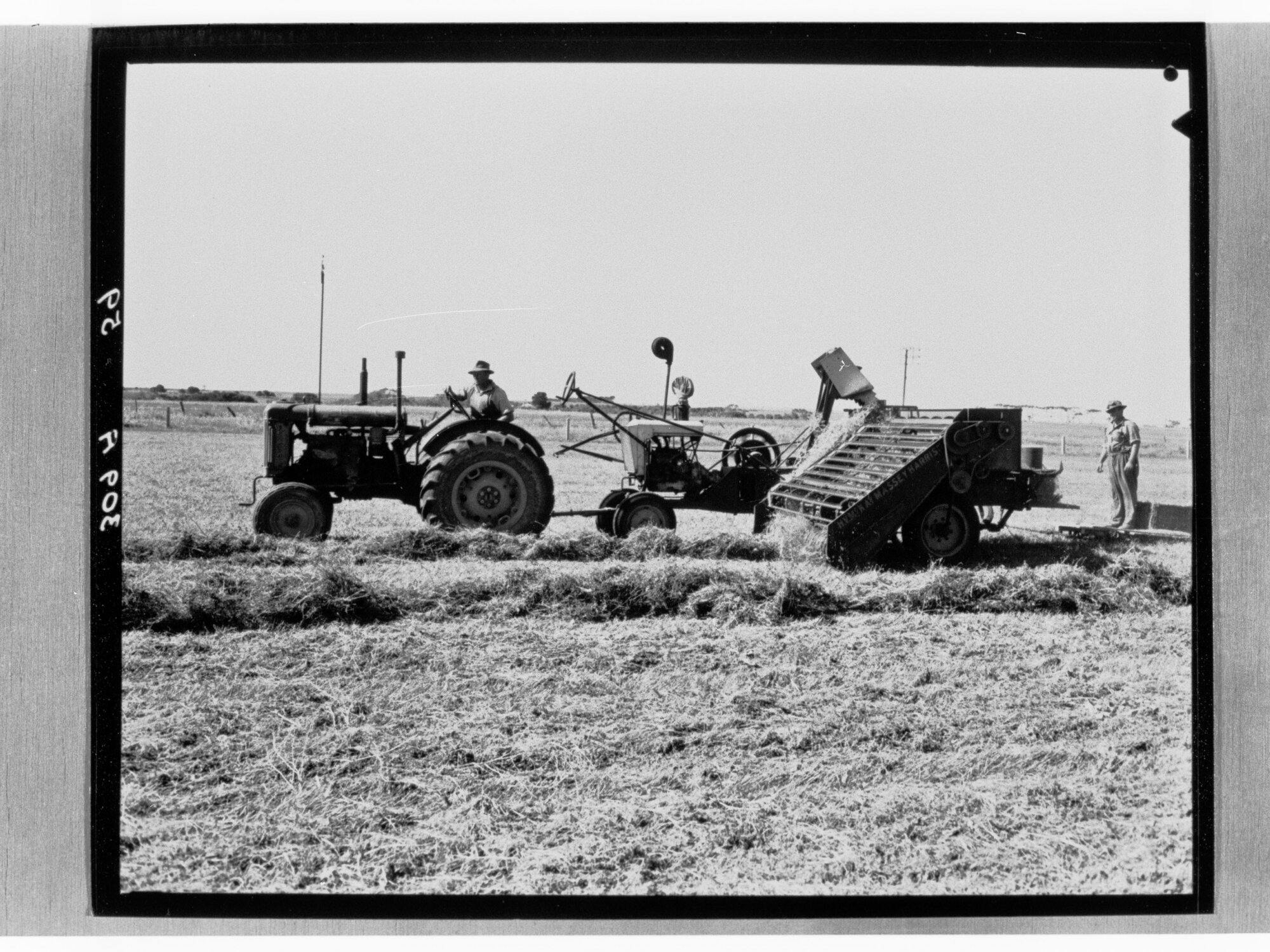 Man on tractor ploughing field