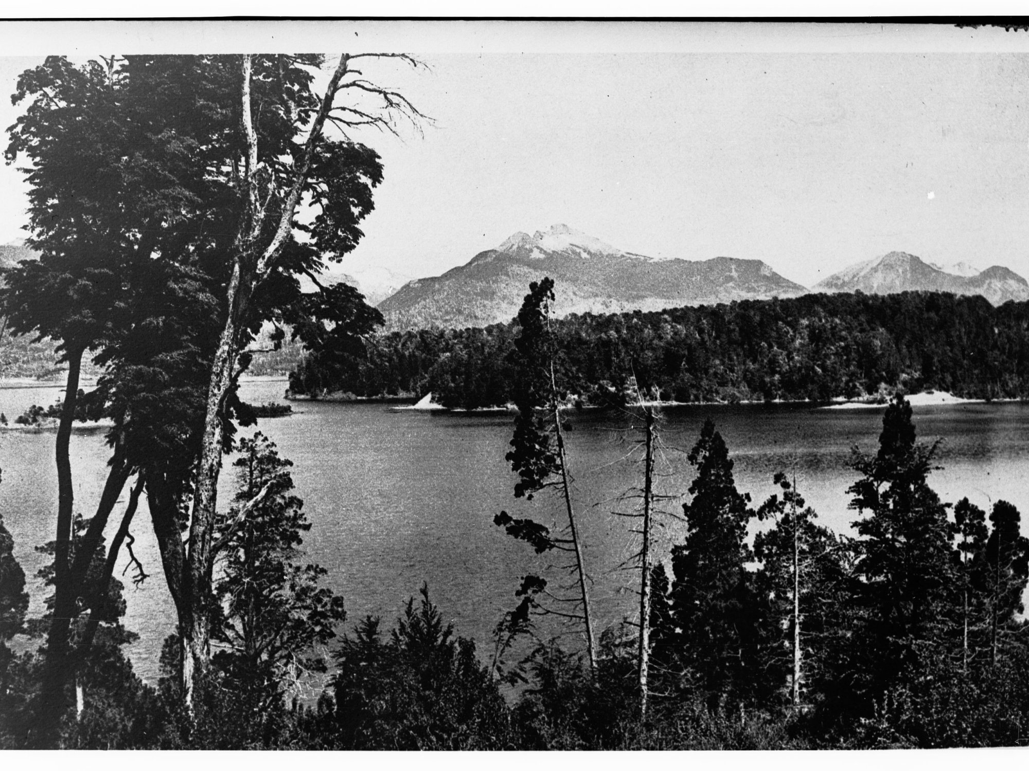 Lake Showing Mountains and Trees