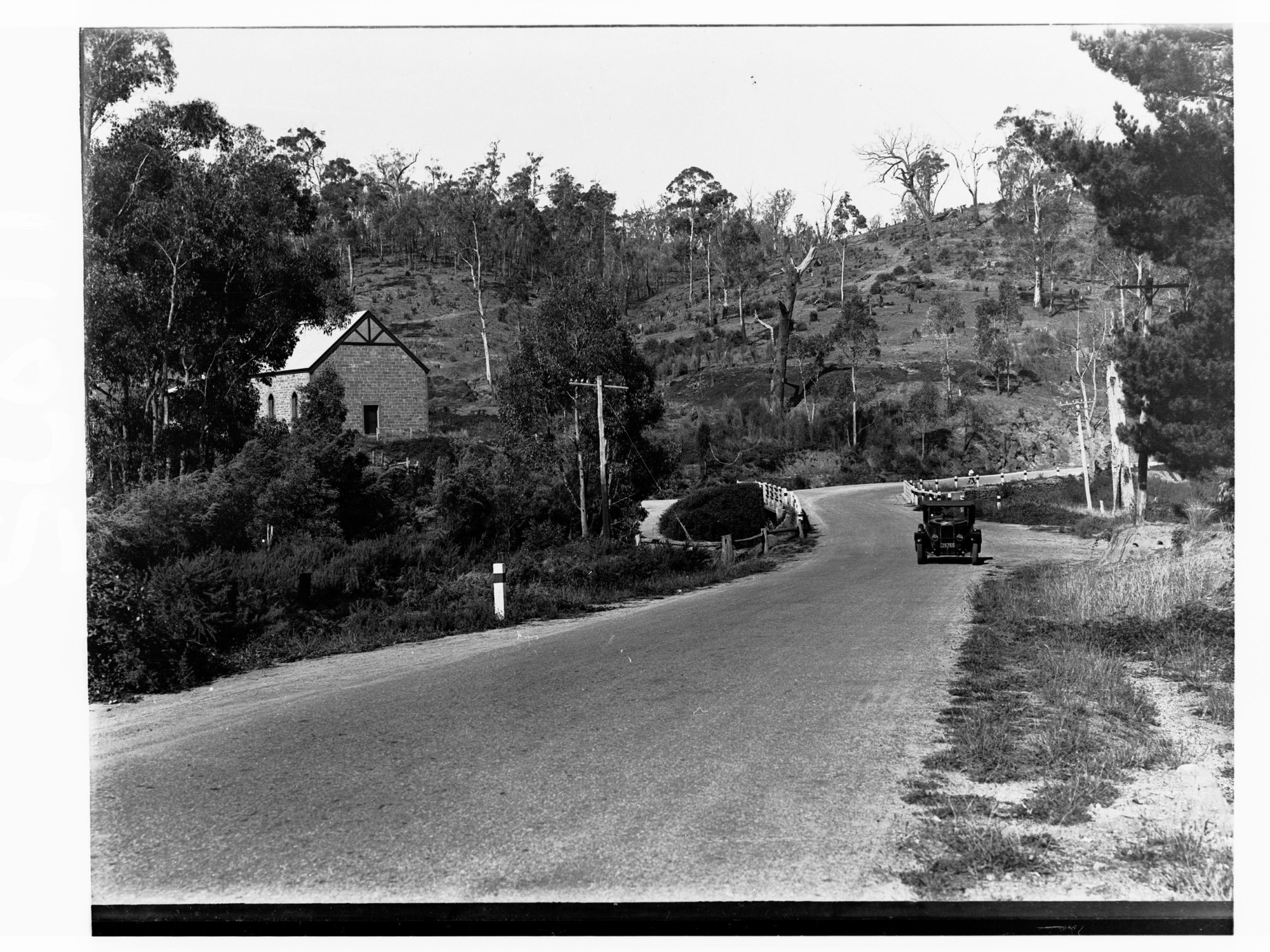Automobile on road by Anglican Mission Hall at Stony Creek near Forest Range