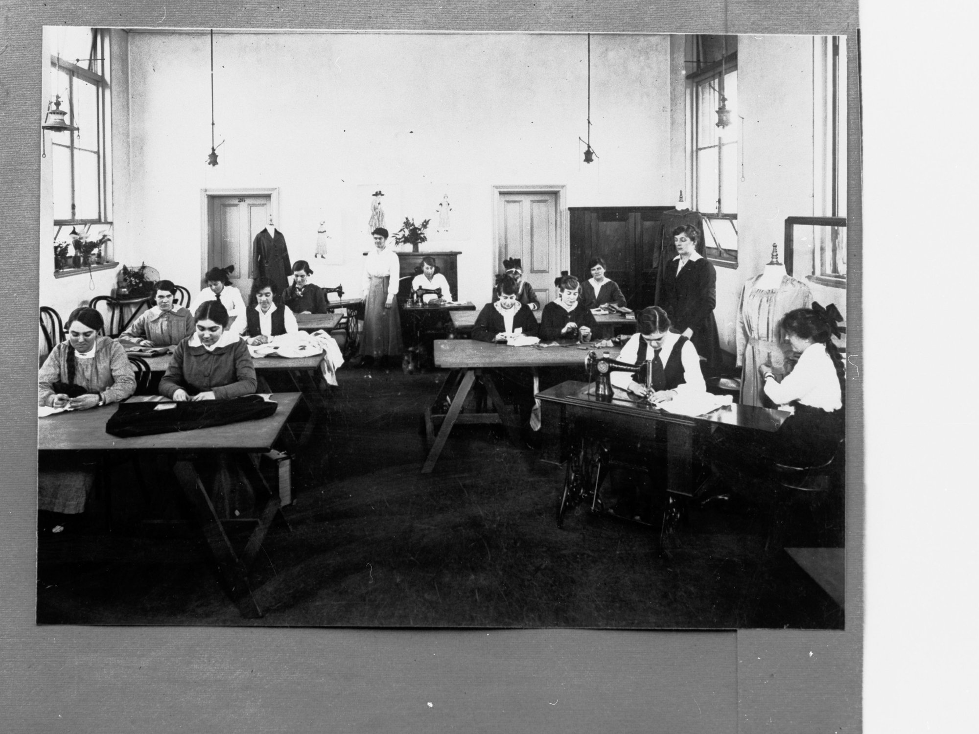 Schoolgirls in dressmaking (sewing) class, unknown South Australian school
