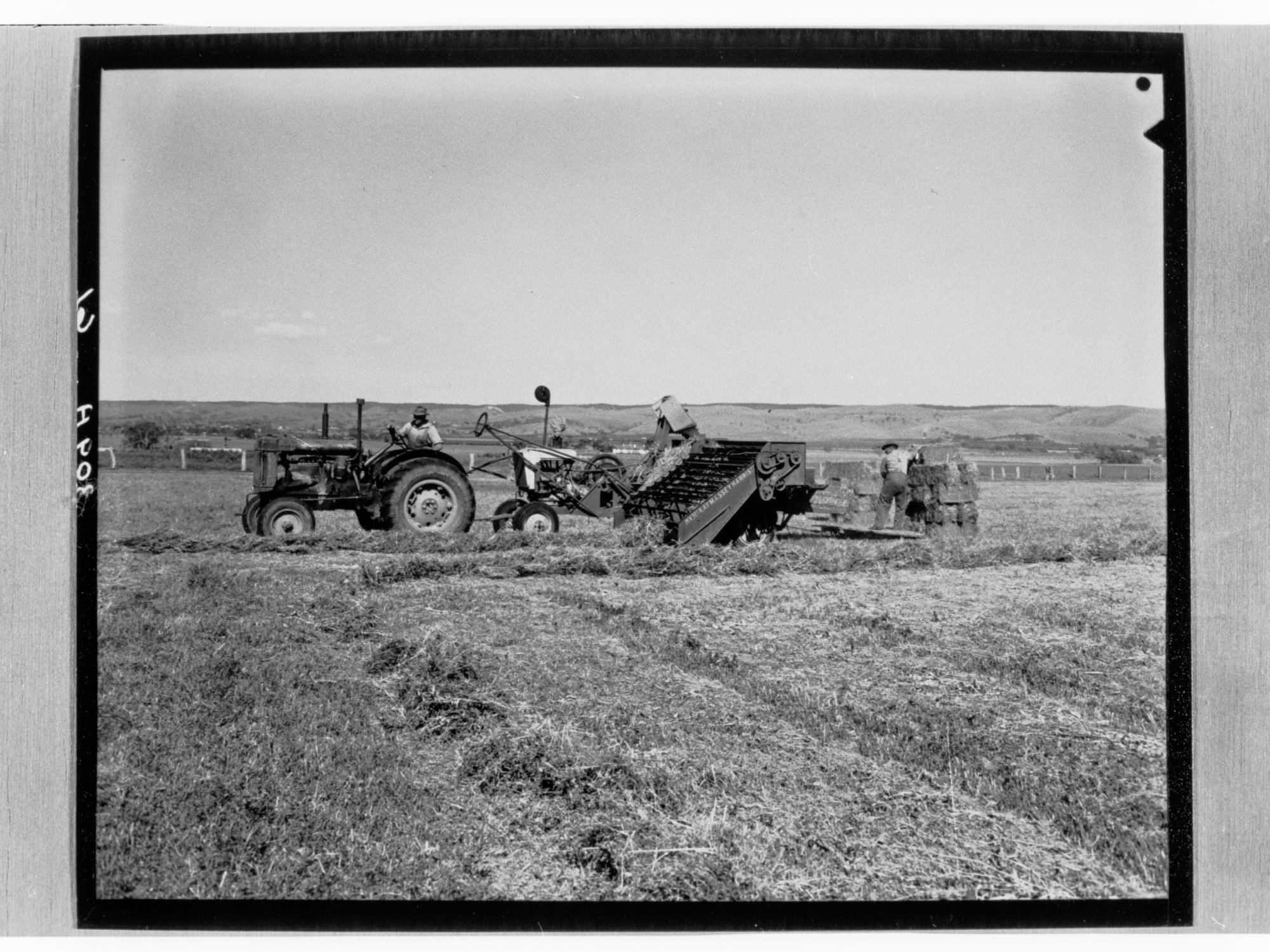 Man on tractor ploughing field