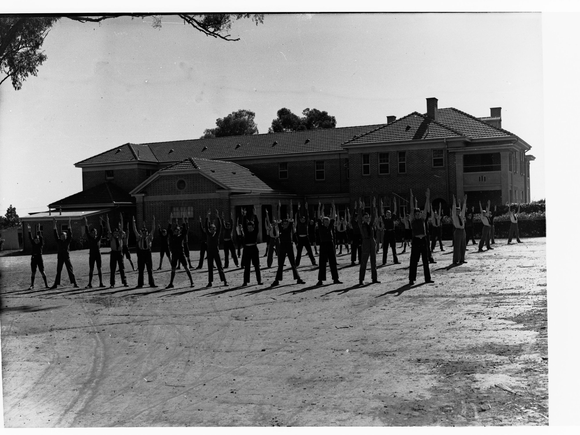 Urrbrae Agricultural College showing students exercising on oval