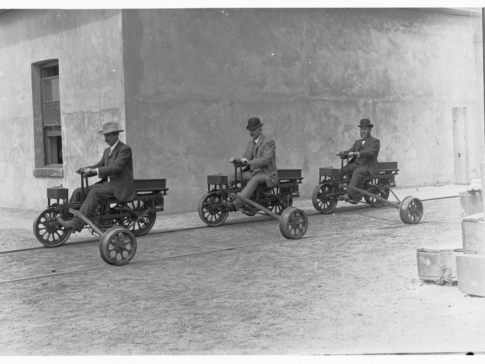Three men riding Railway Motor Tricycle - South Australian Railway negatives