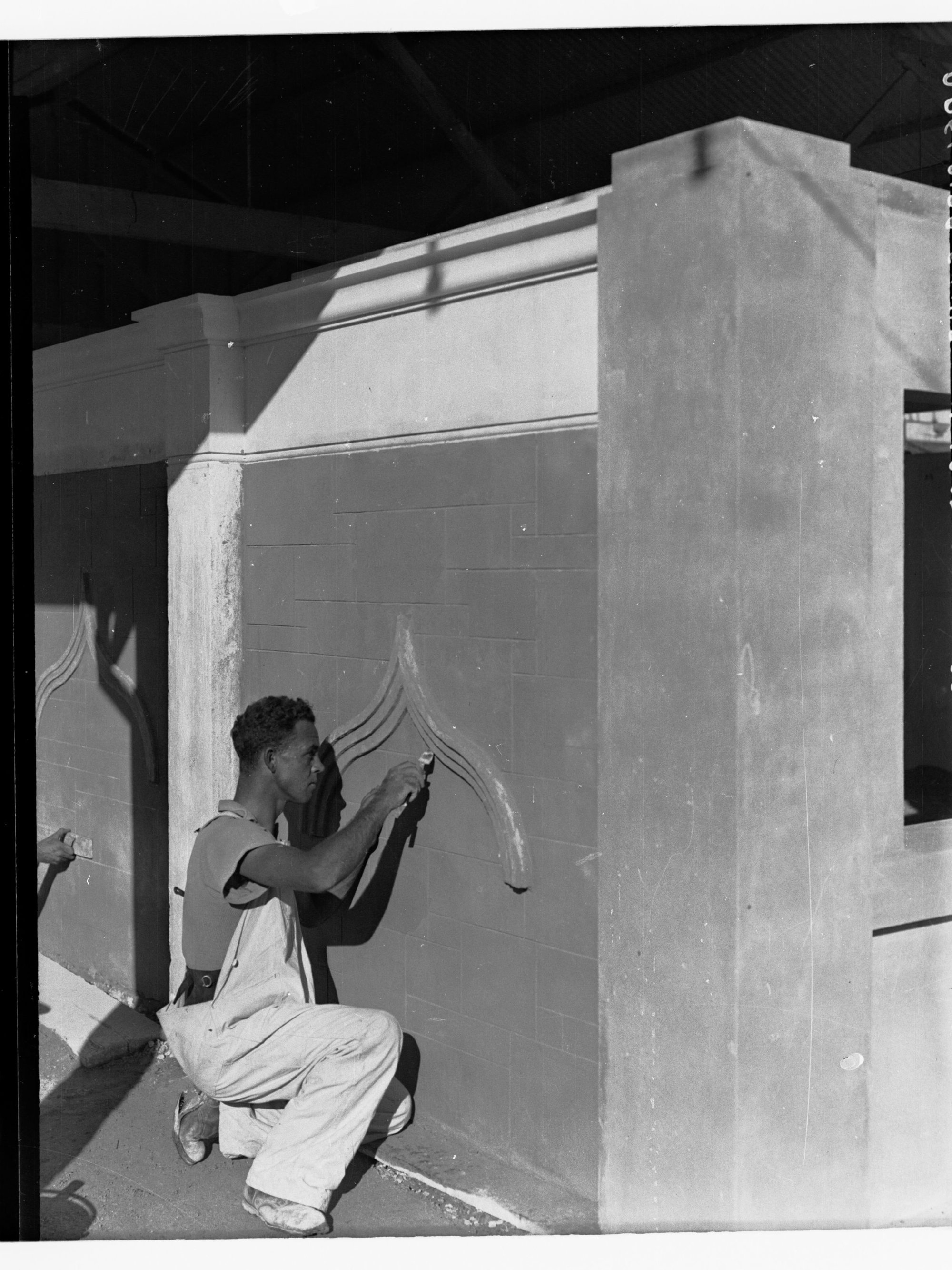 Trainee Plasterer at Work