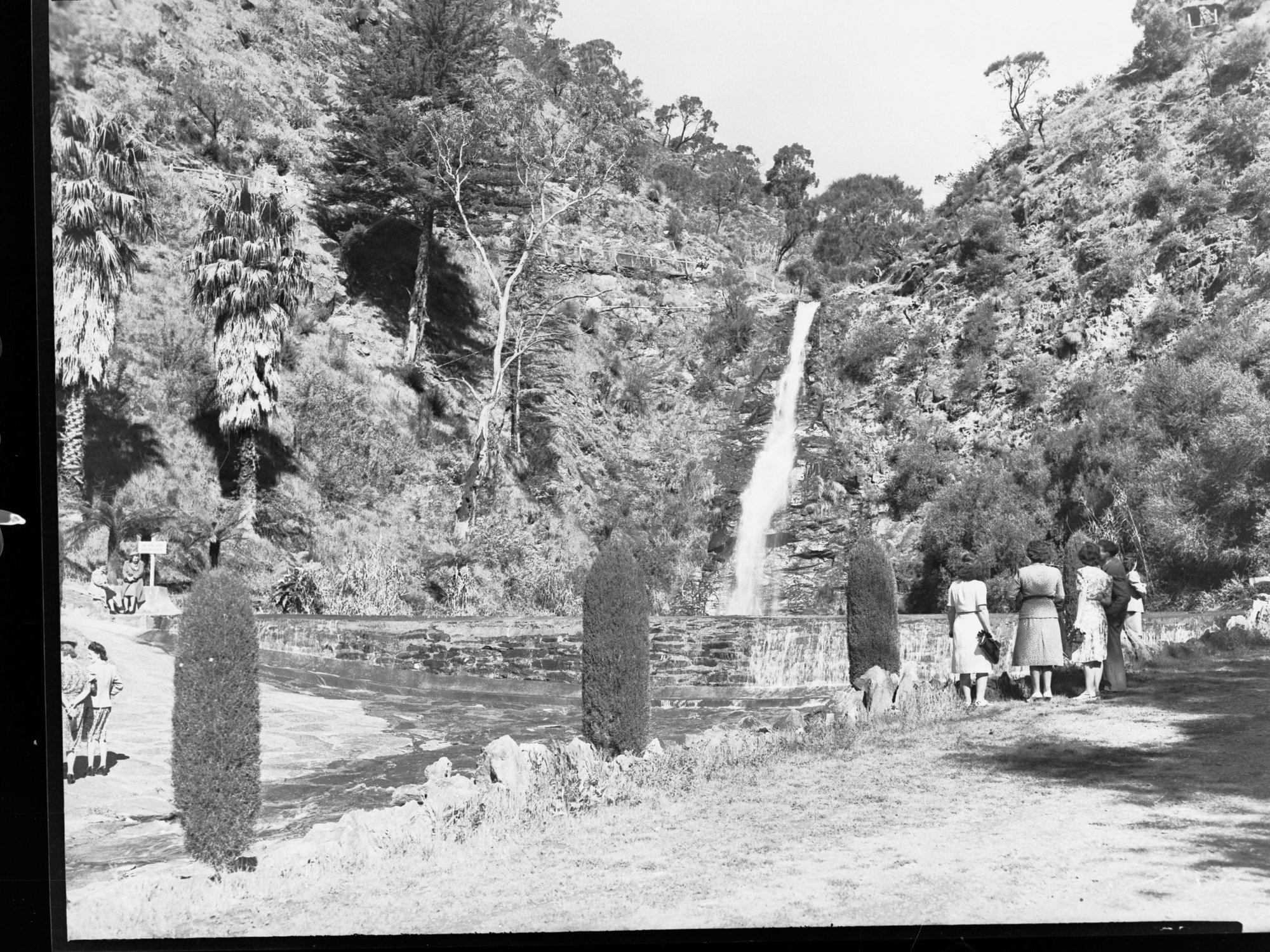 Waterfall Gully Showing People Watching Waterfall