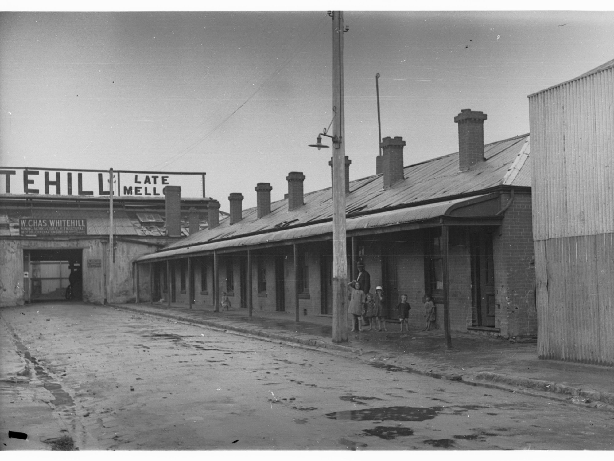 Ranelagh Street, off Waymouth St near Light Square in the West End of the city.  It shows William Charles Whitehill's engineering workshop.  Domestic housing can be seen also.