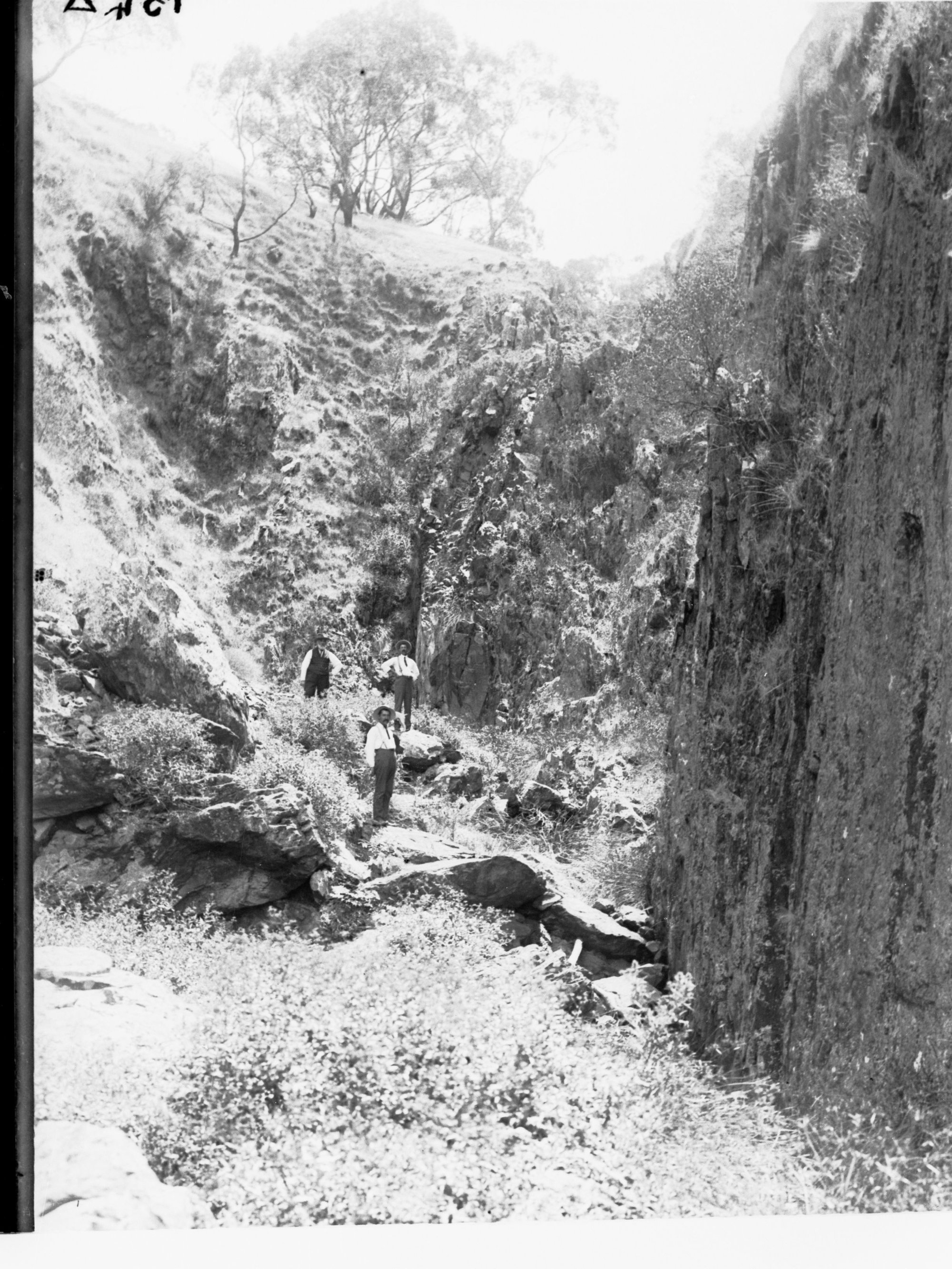 Granite Island Men Standing on Rocks