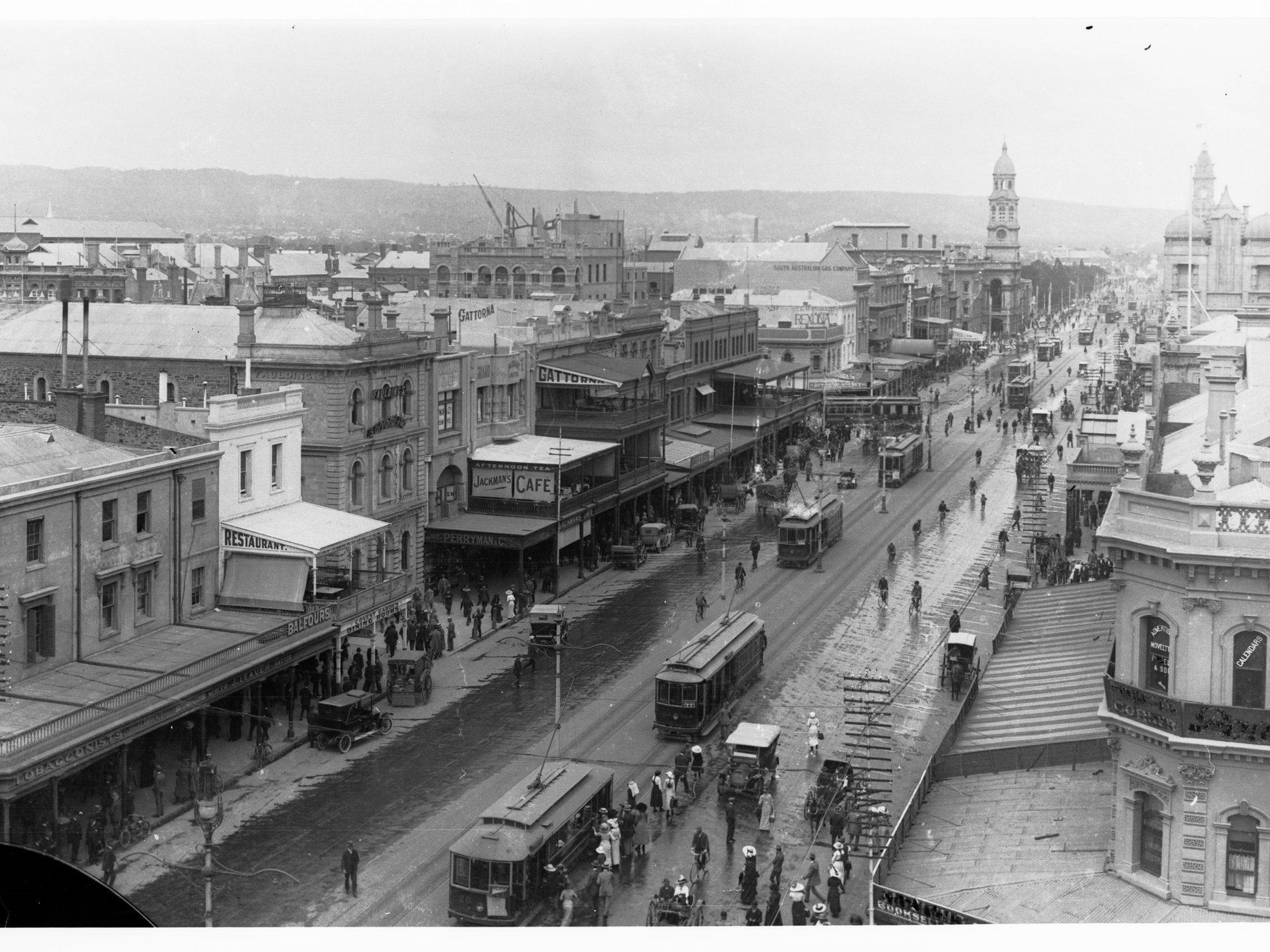 King William Street looking south showing trams and the town hall in distance