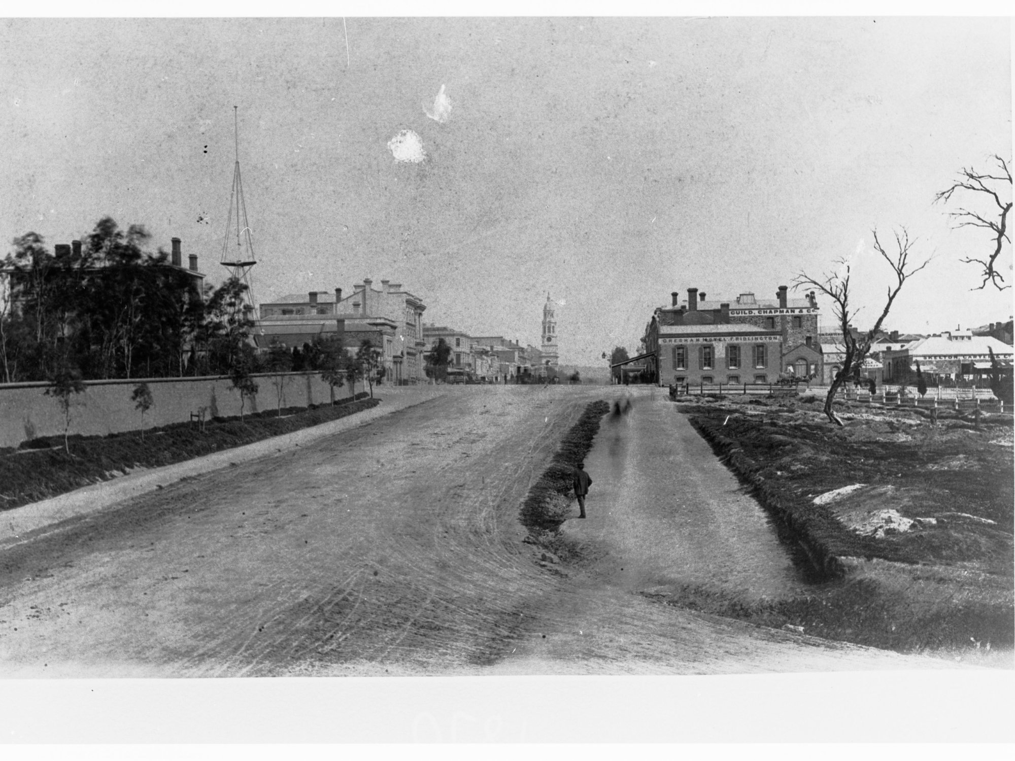Looking south along King William Street, acoss North Terrace intersection (Gresham Hotel on right, Town Hall in background on left)