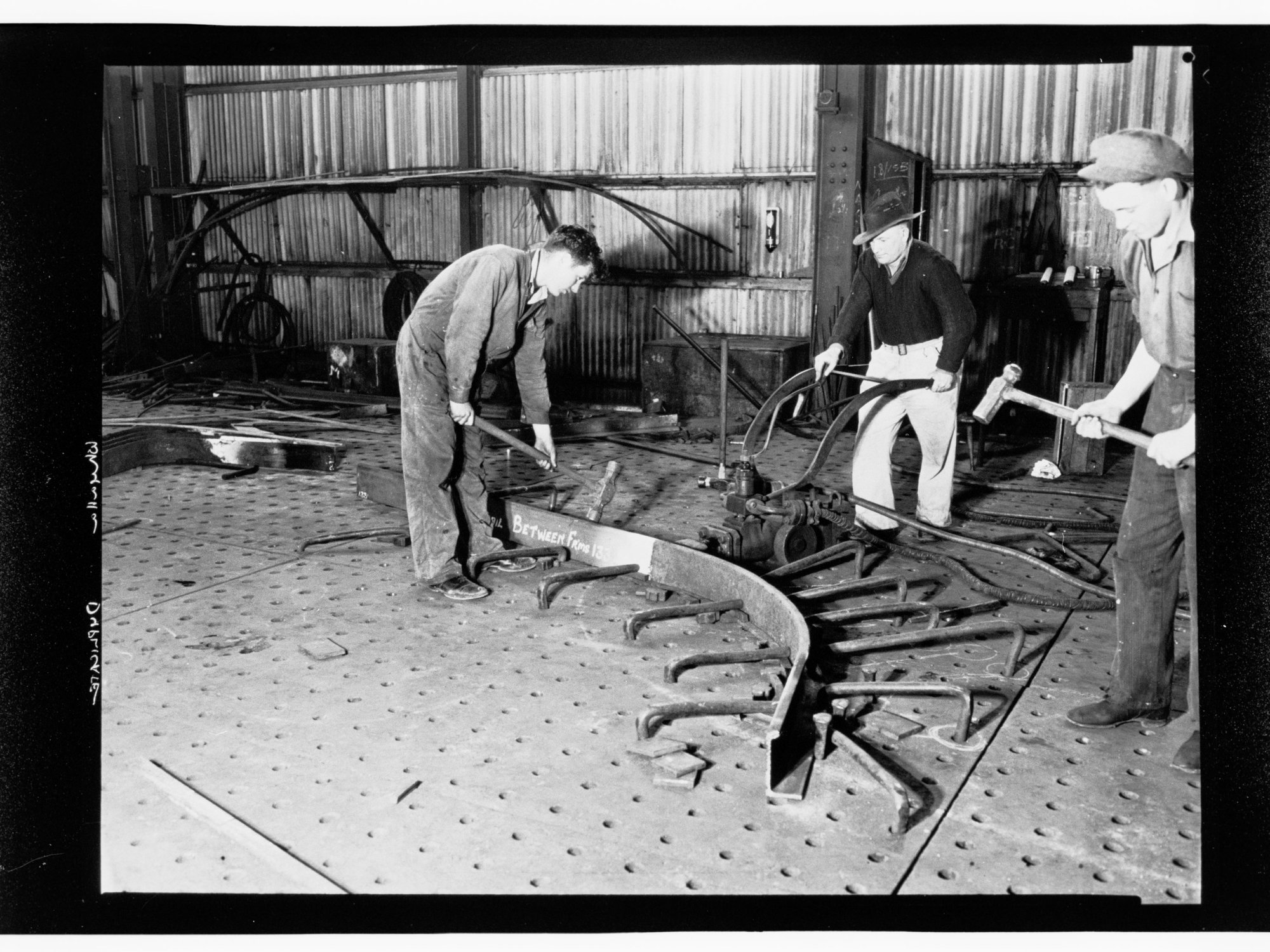Whyalla - three men using industrial equipment