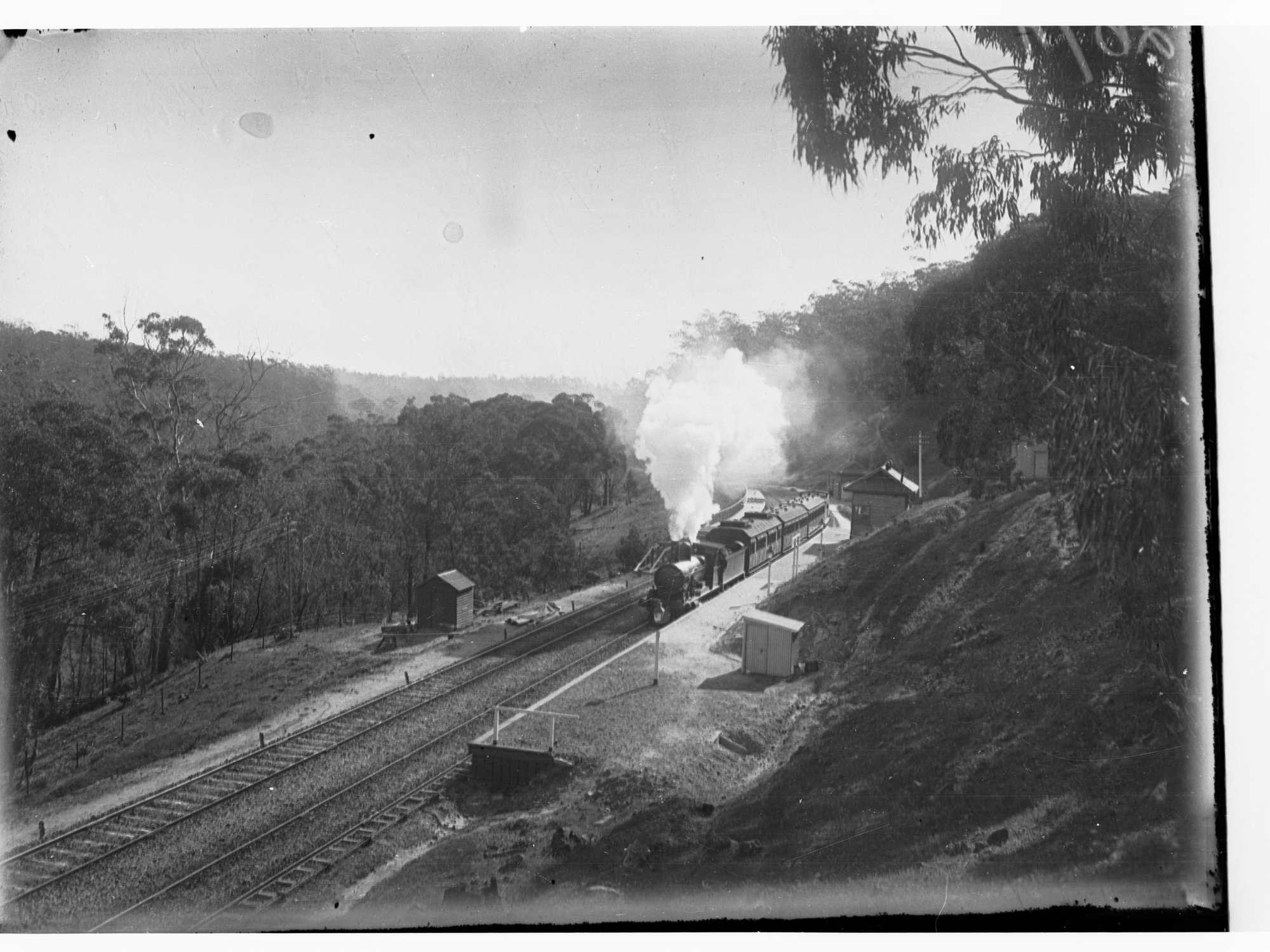 Steam locomotive near station