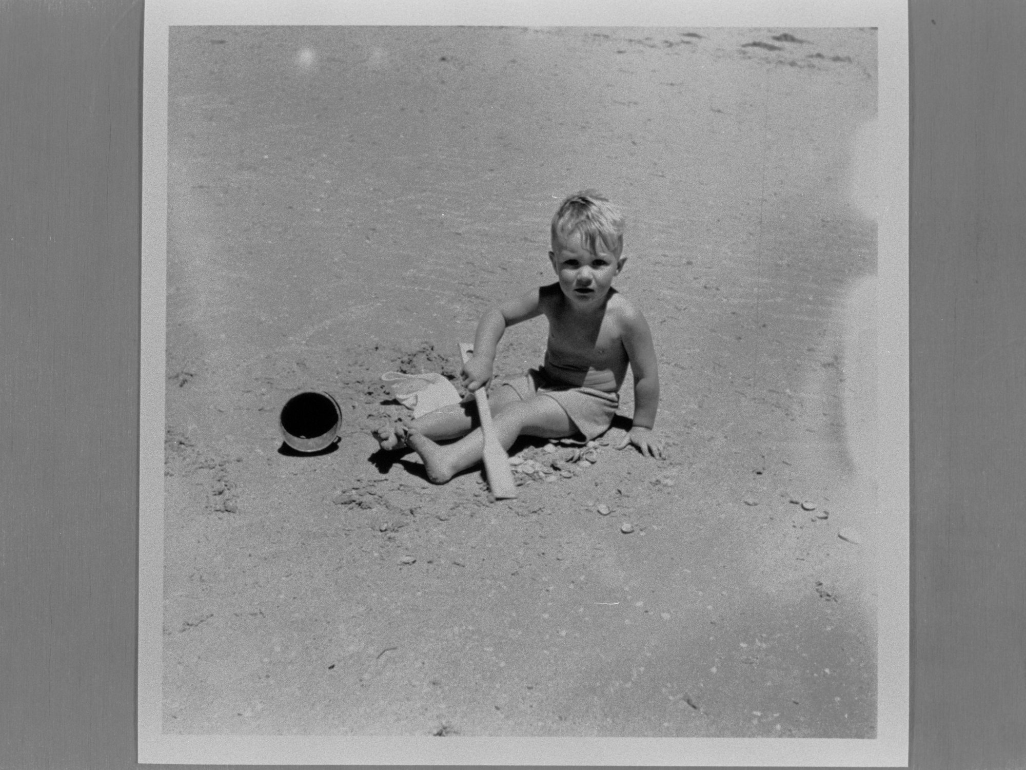Young boy playing in the sand