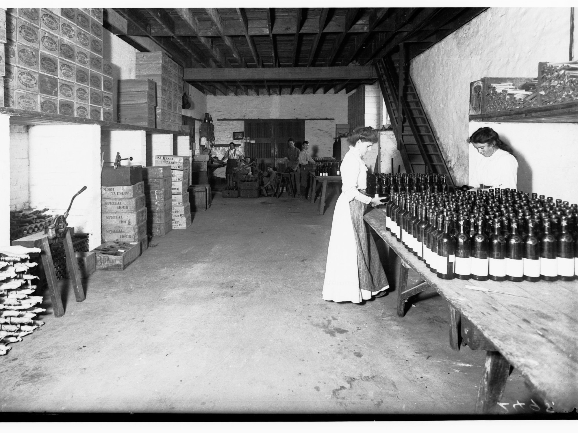 Bottling and packing wine - women working - St. Henry Claret