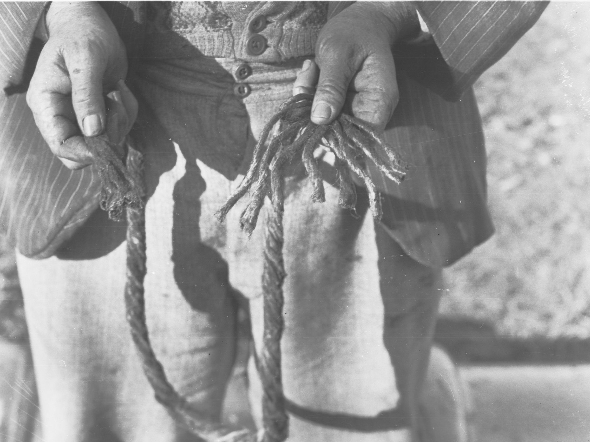 Sewers Department, Oaklands, man holding a rope
