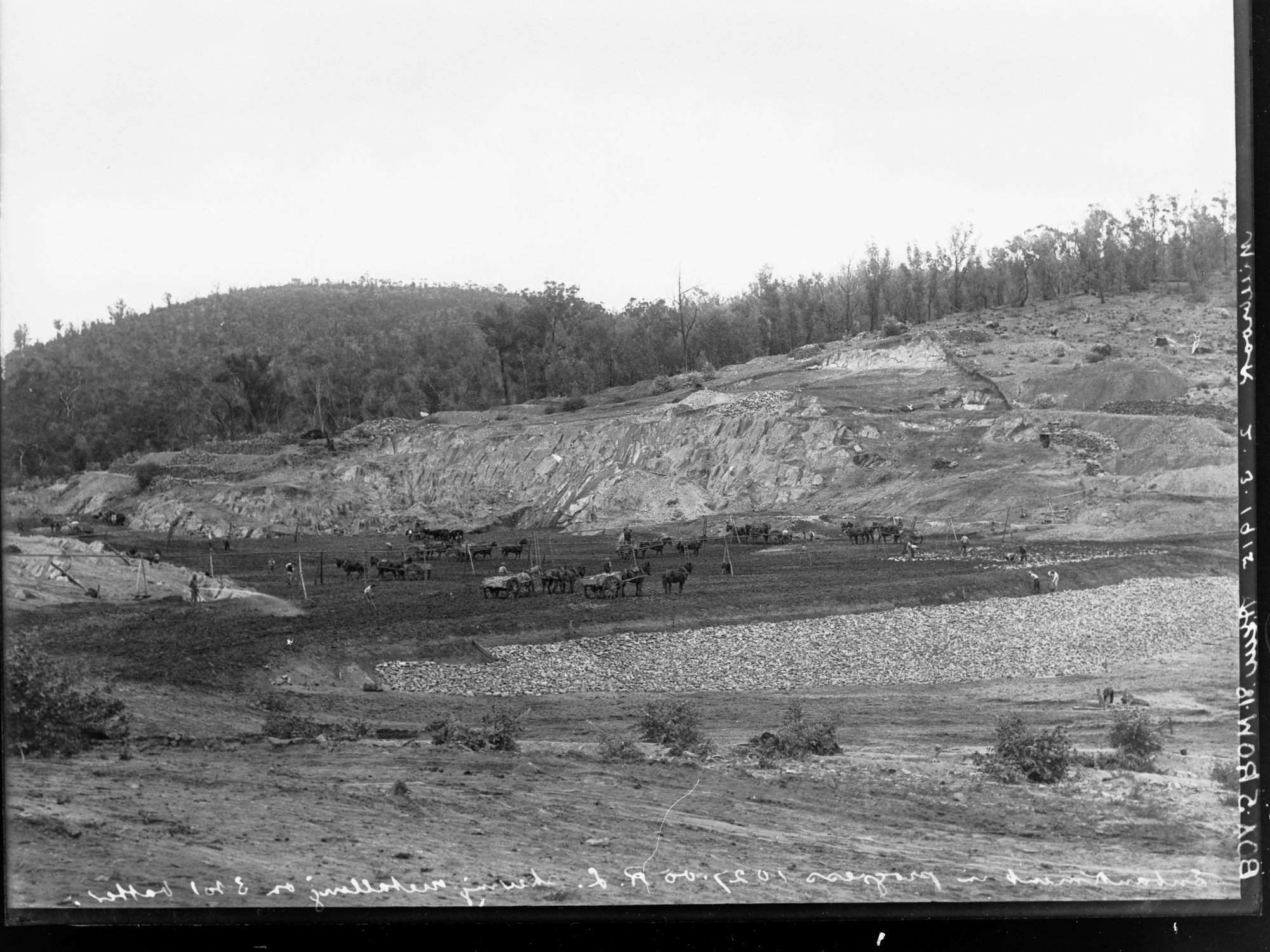 Construction of Millbrook Reservoir Dam,  South Australia, embankment progress at 1027.00 reduced level showing metalling on 3 to 1 batter