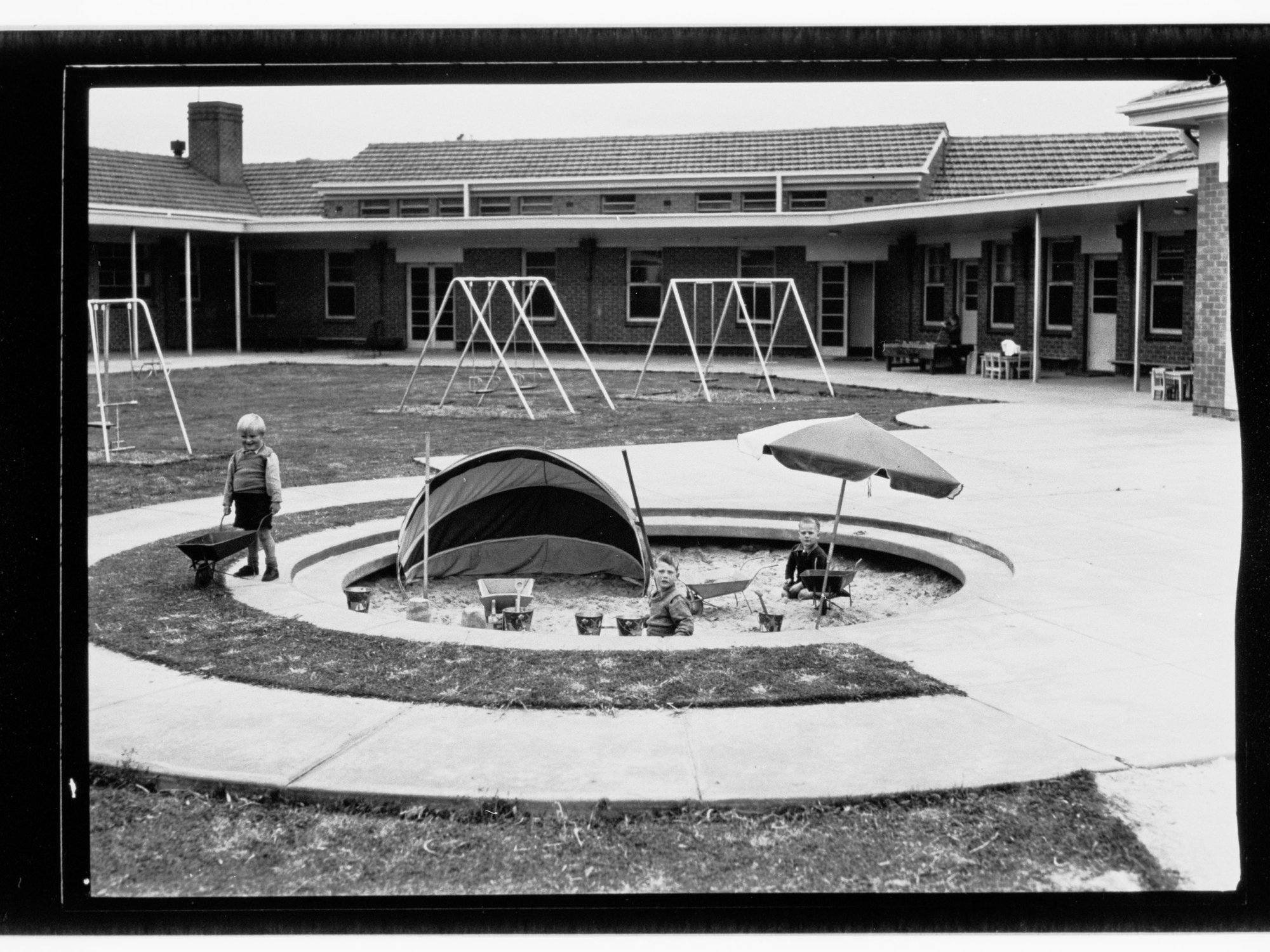 Child Welfare Department,  children playing in sandpit
