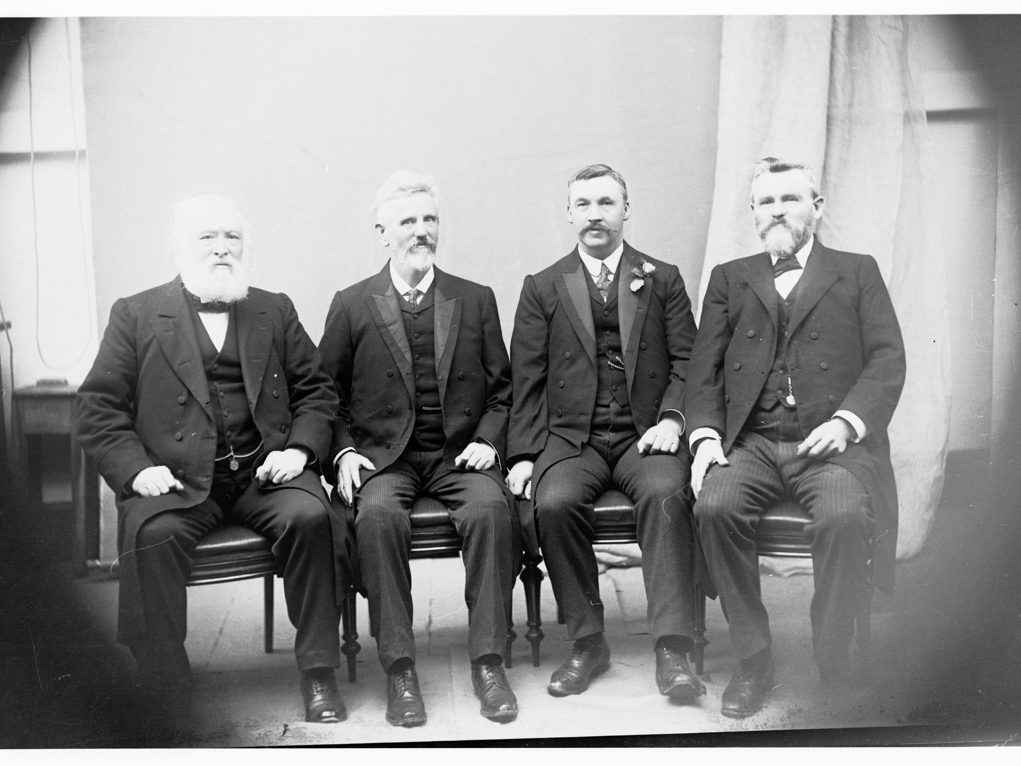 Group photograph of Price Ministry - left to right: A A Kirkpatrick, T Price, AH Peake and L O'Loughlin