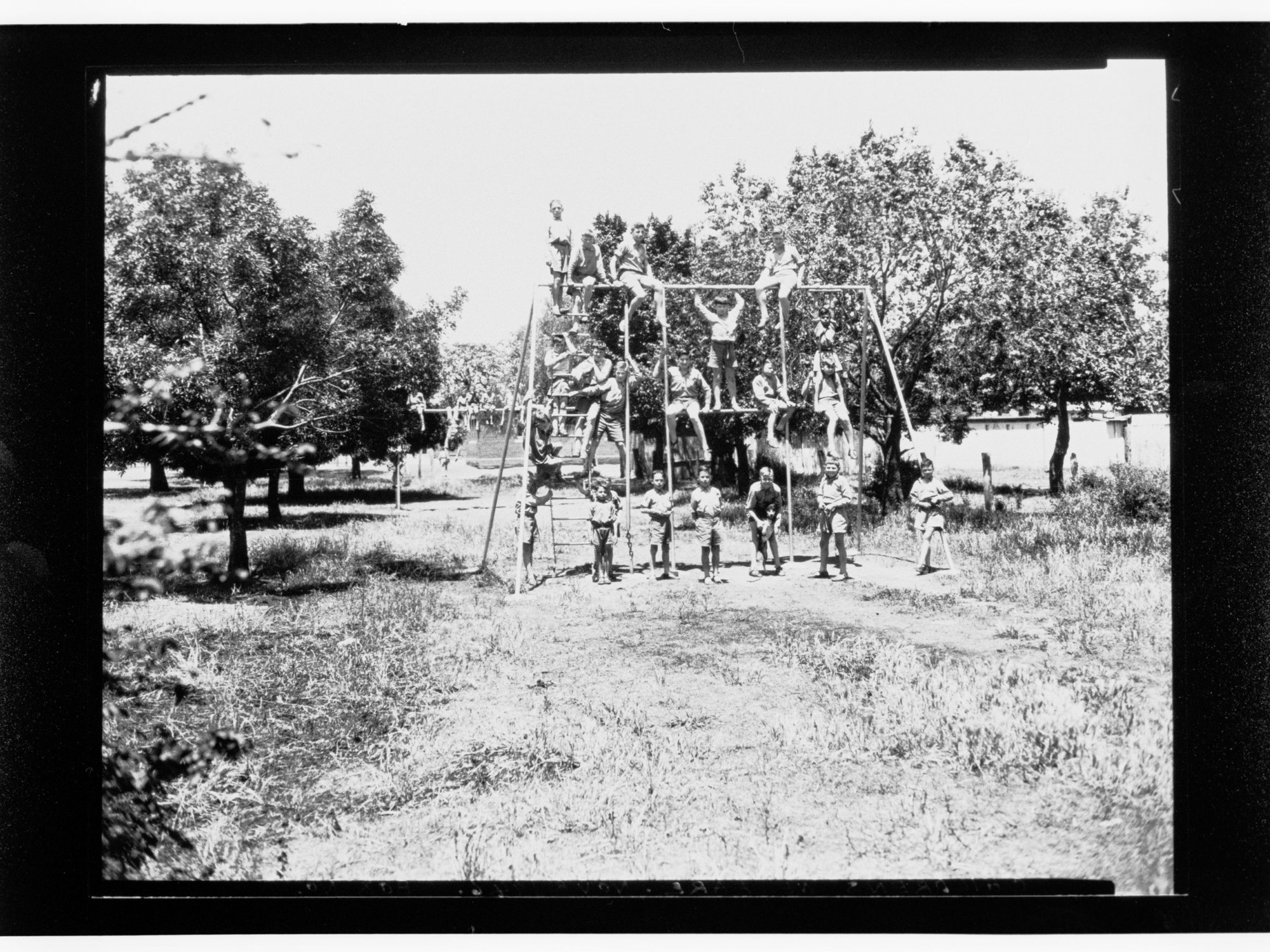 Child Welfare Department - children on playground equipment