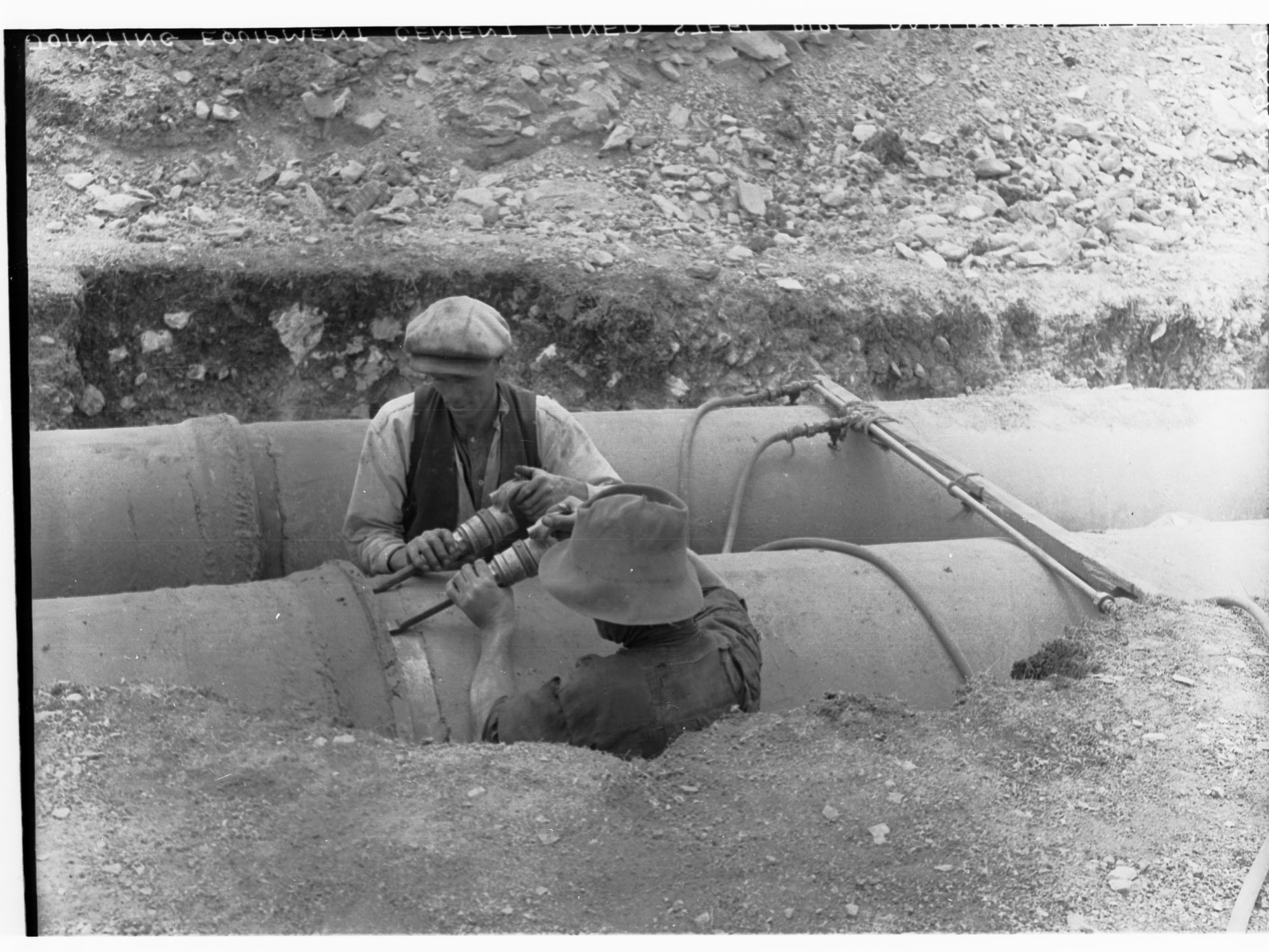 Men fixing pipeline, Darlington