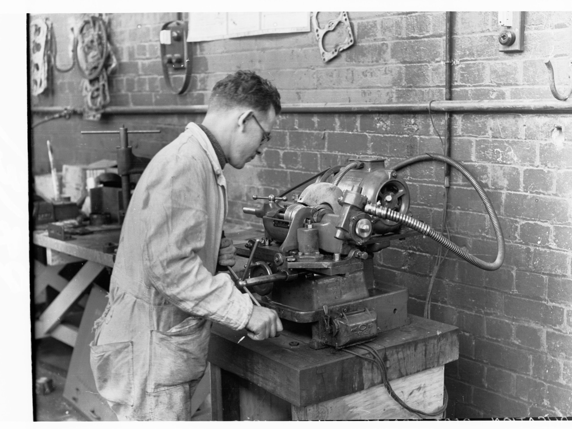 Students using trades school equipment