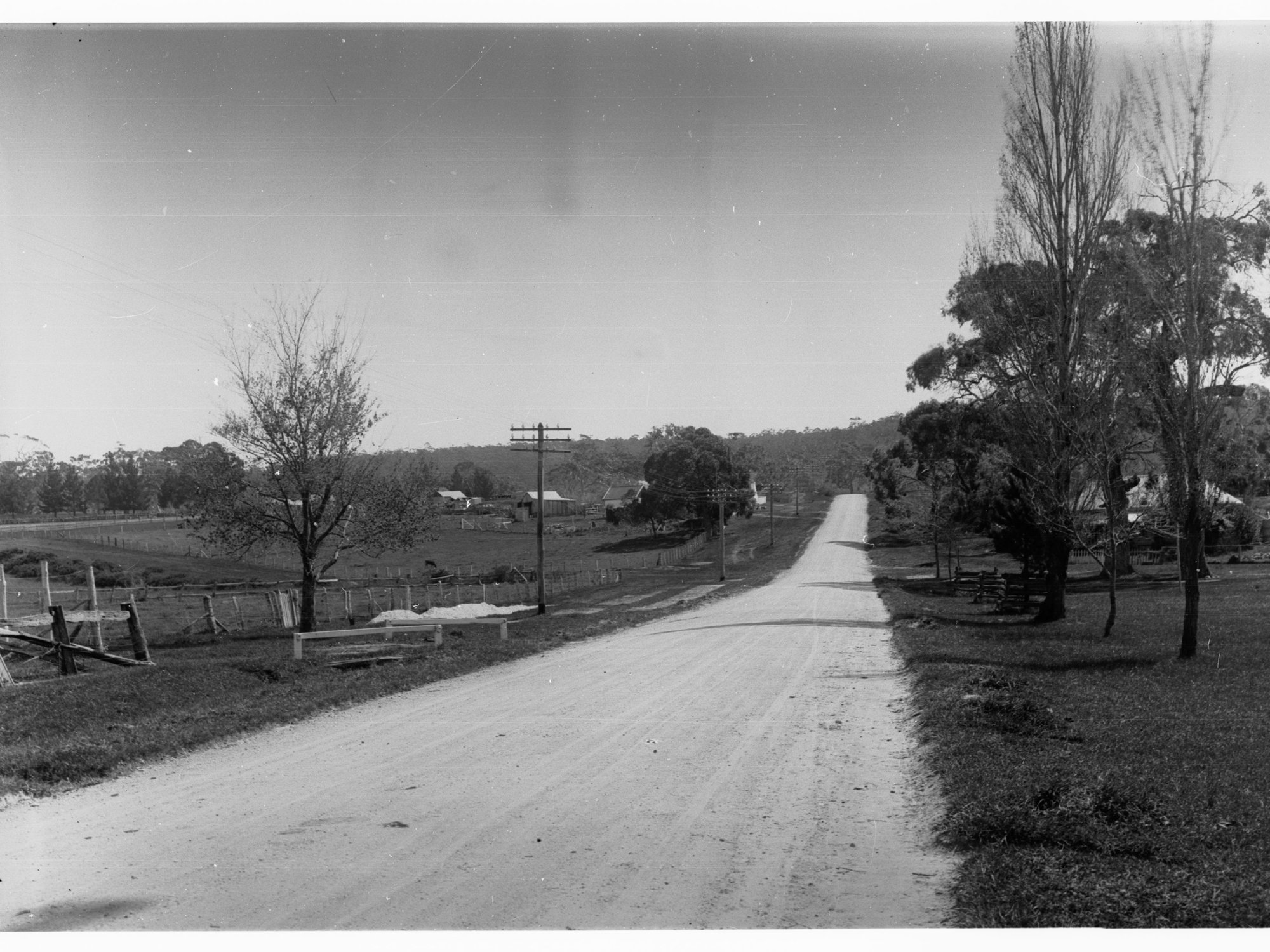 Country Town Showing Dirt Road and Farm Houses