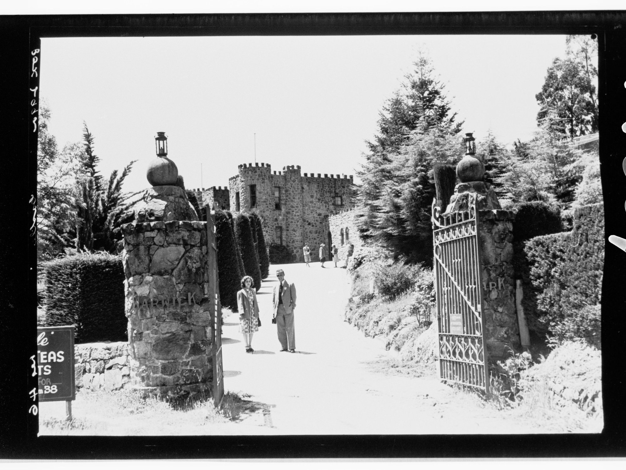 Visitors at entrance to the tea rooms, 'The Castle', Basket Range