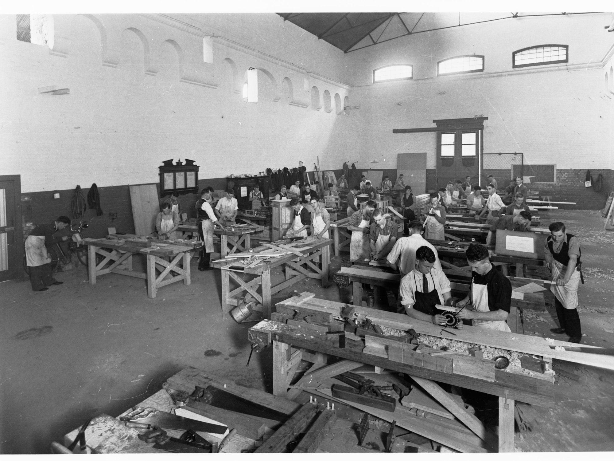 Education Department Trade School showing students doing woodwork