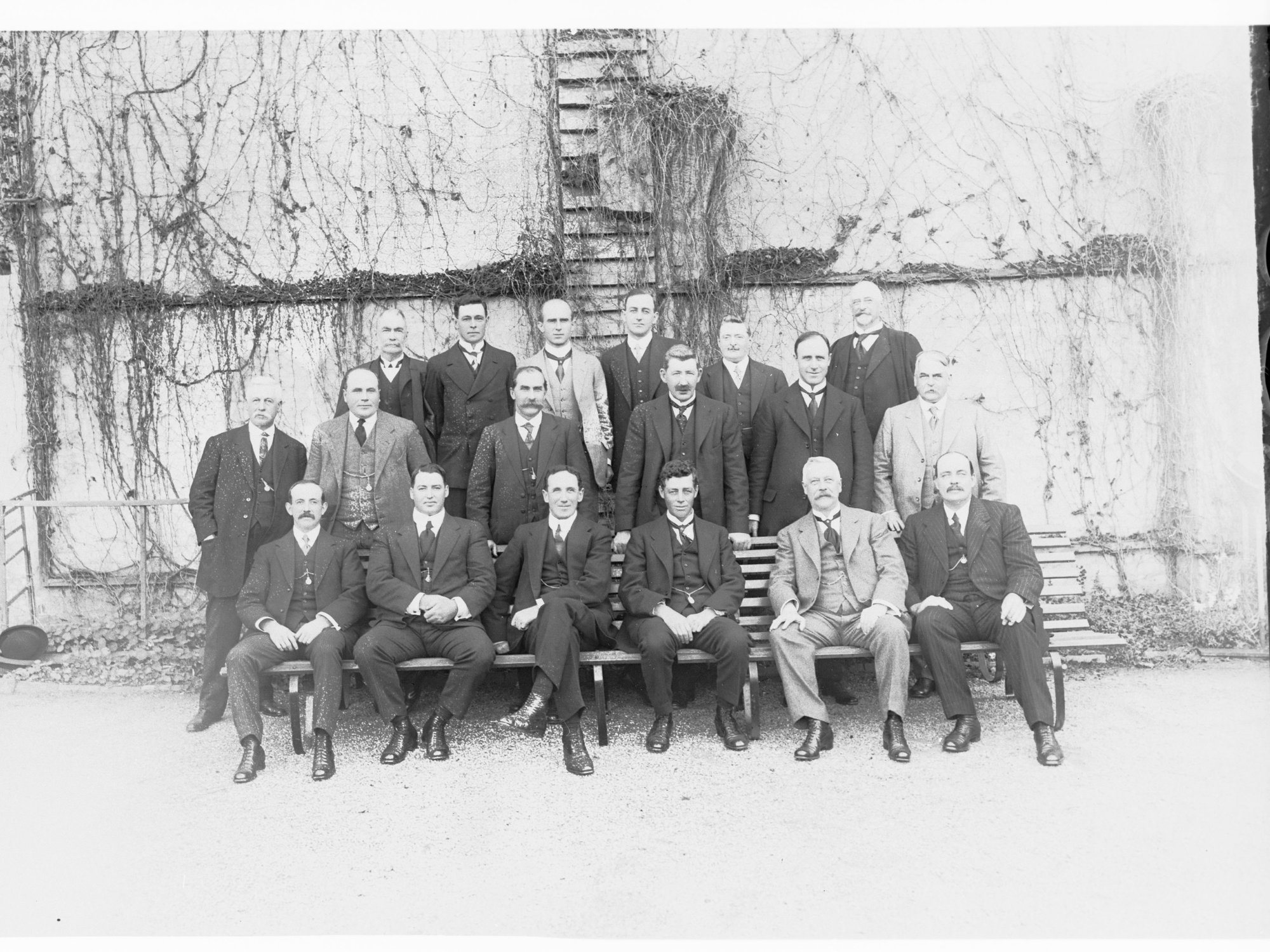 Group portrait of 18 men (may relate to Premiers' Conference)
