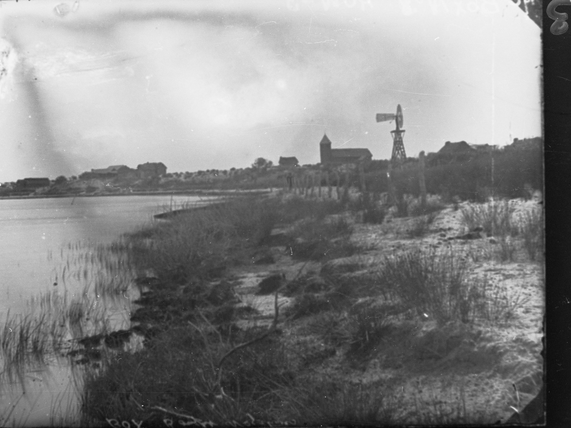Killalpaninna Mission, view of lake showing windmill and church
