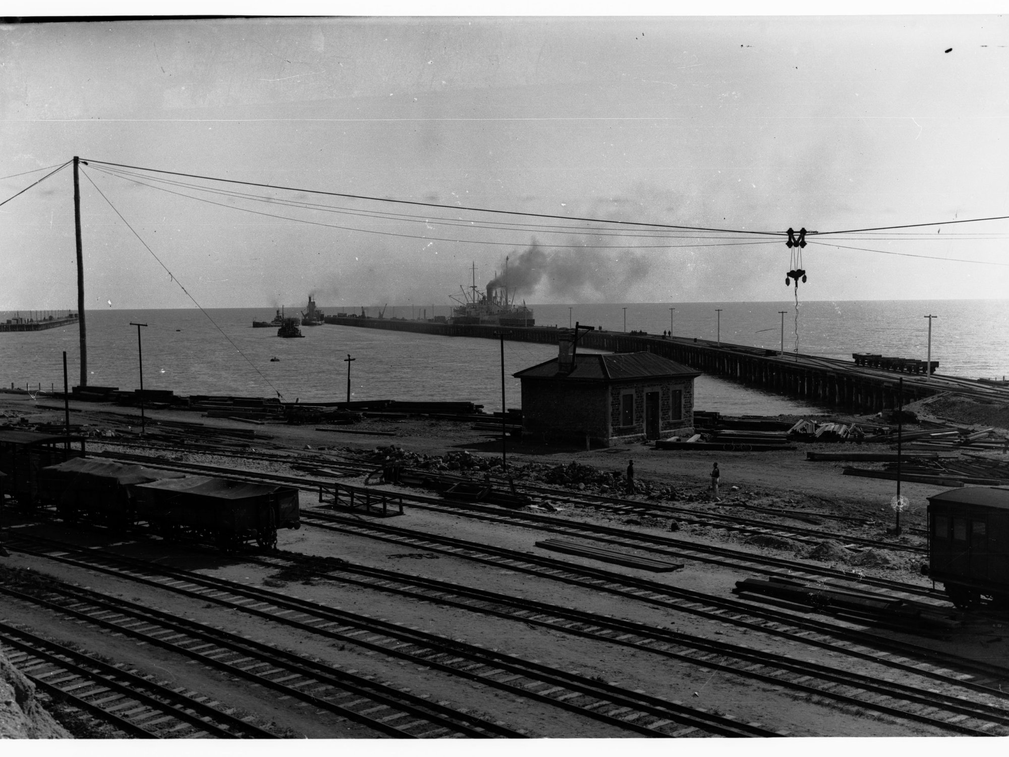 New jetty, Wallaroo, showing railway tracks and a ship berthed
