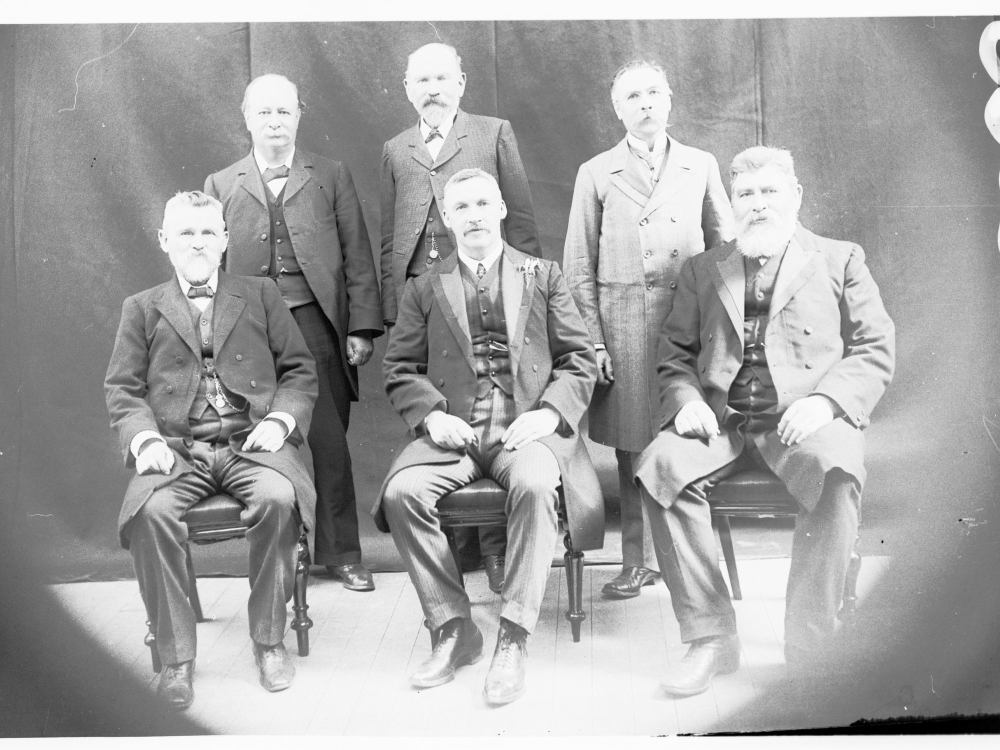 Group photograph of Peake Ministry - 1909 - 1910 (shows W Hague, L O'Loughlin, A Peake and J G Bice)
