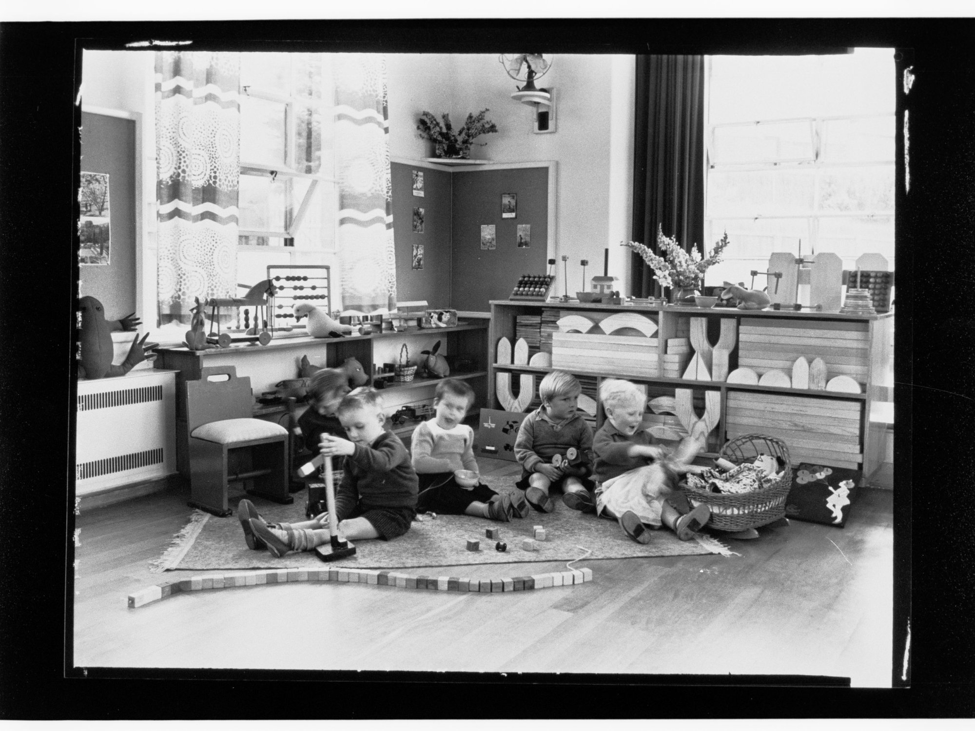 Children's Welfare Department -  children playing with blocks in playroom