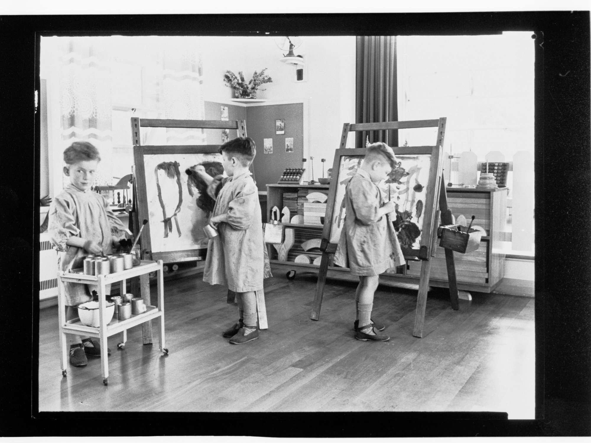 Children's Welfare Department - children painting in playroom
