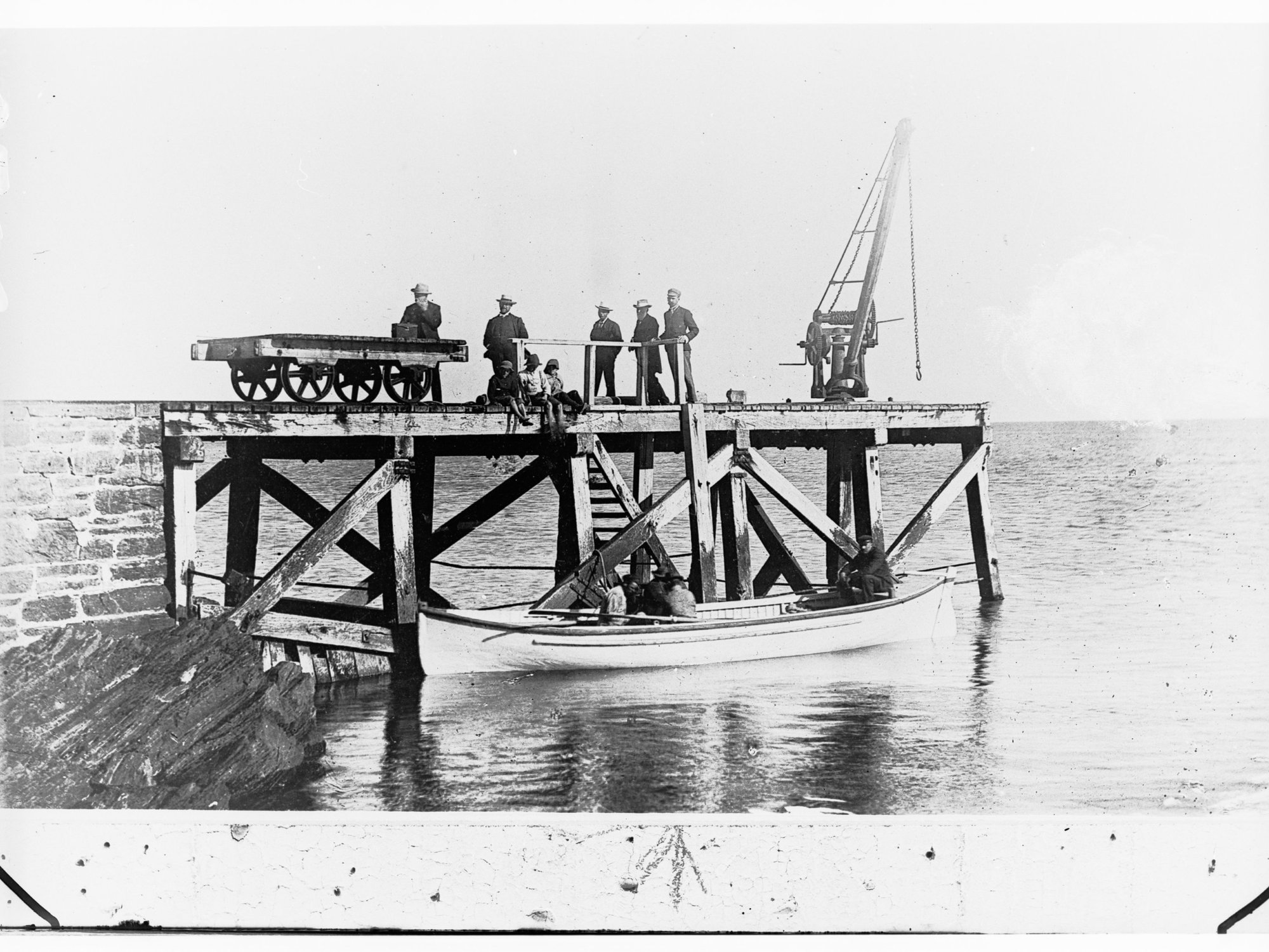 Second Valley Jetty - men and children on jetty and in row boat