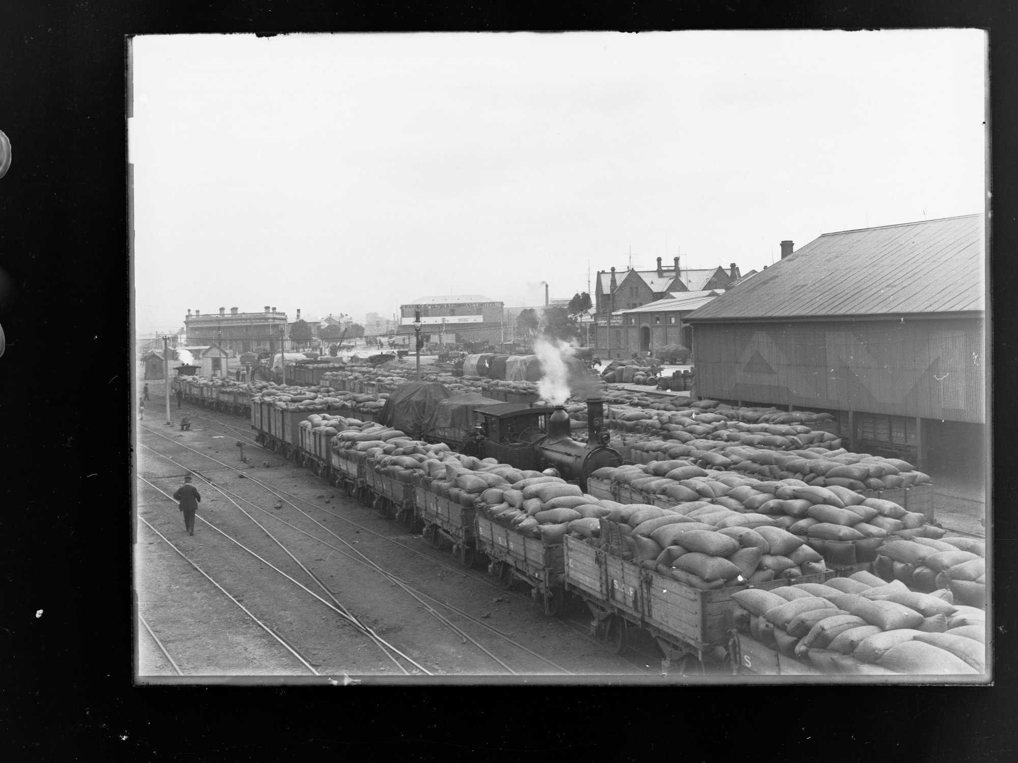 Rail trucks transporting wheat,  Port Adelaide.
