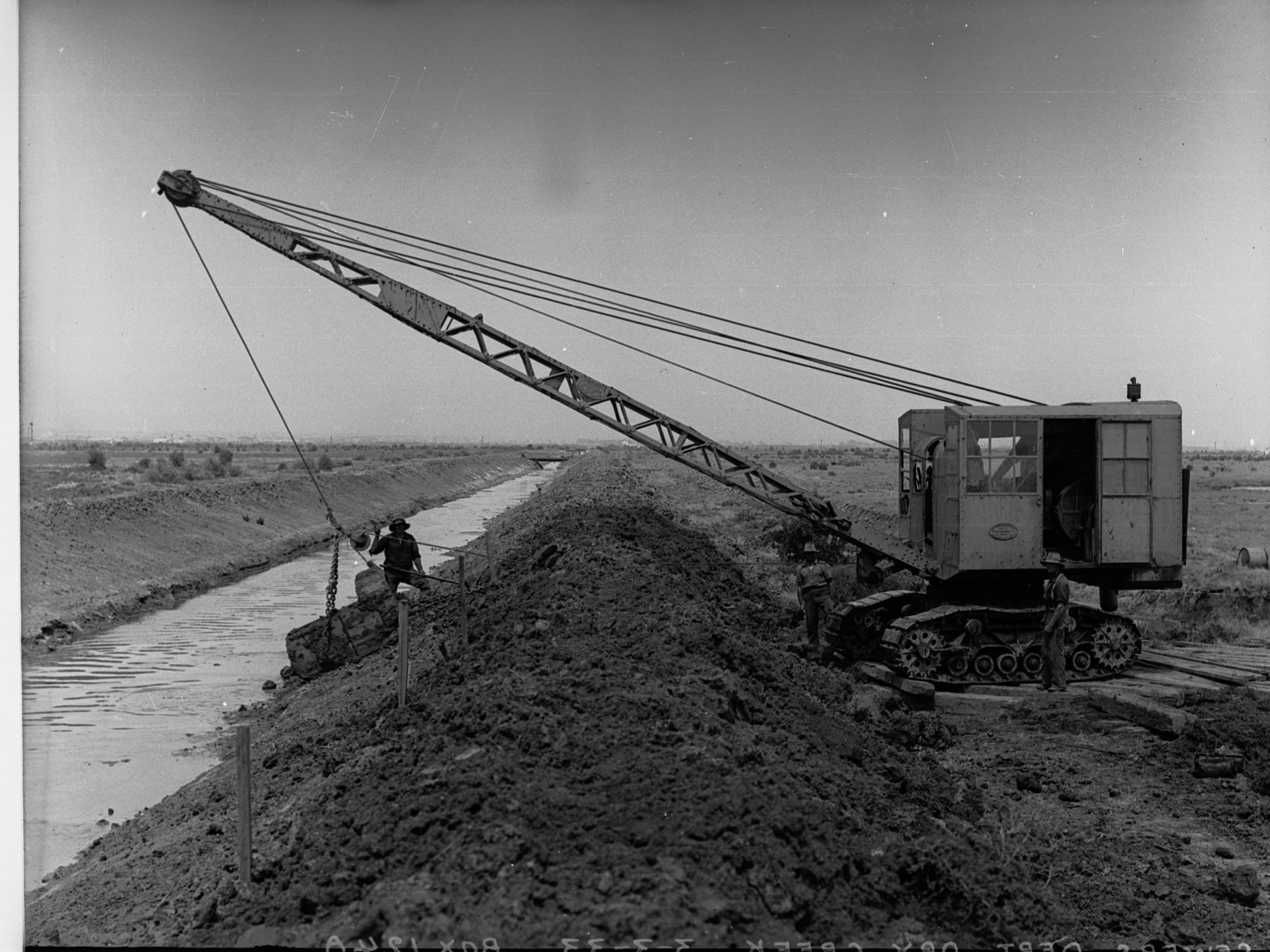 Excavator working for sewers department at Dry Creek