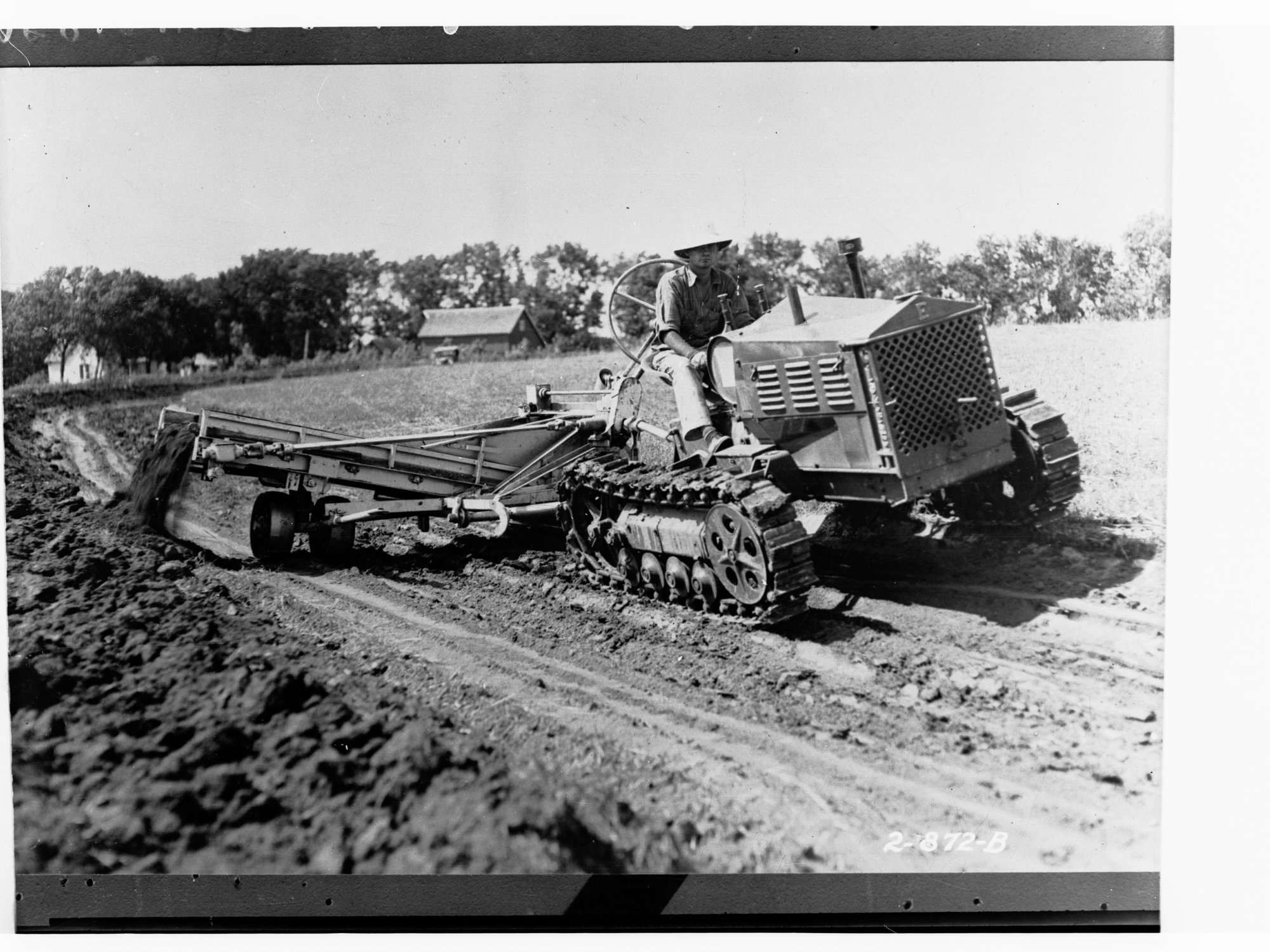 Tractor ploughing field
