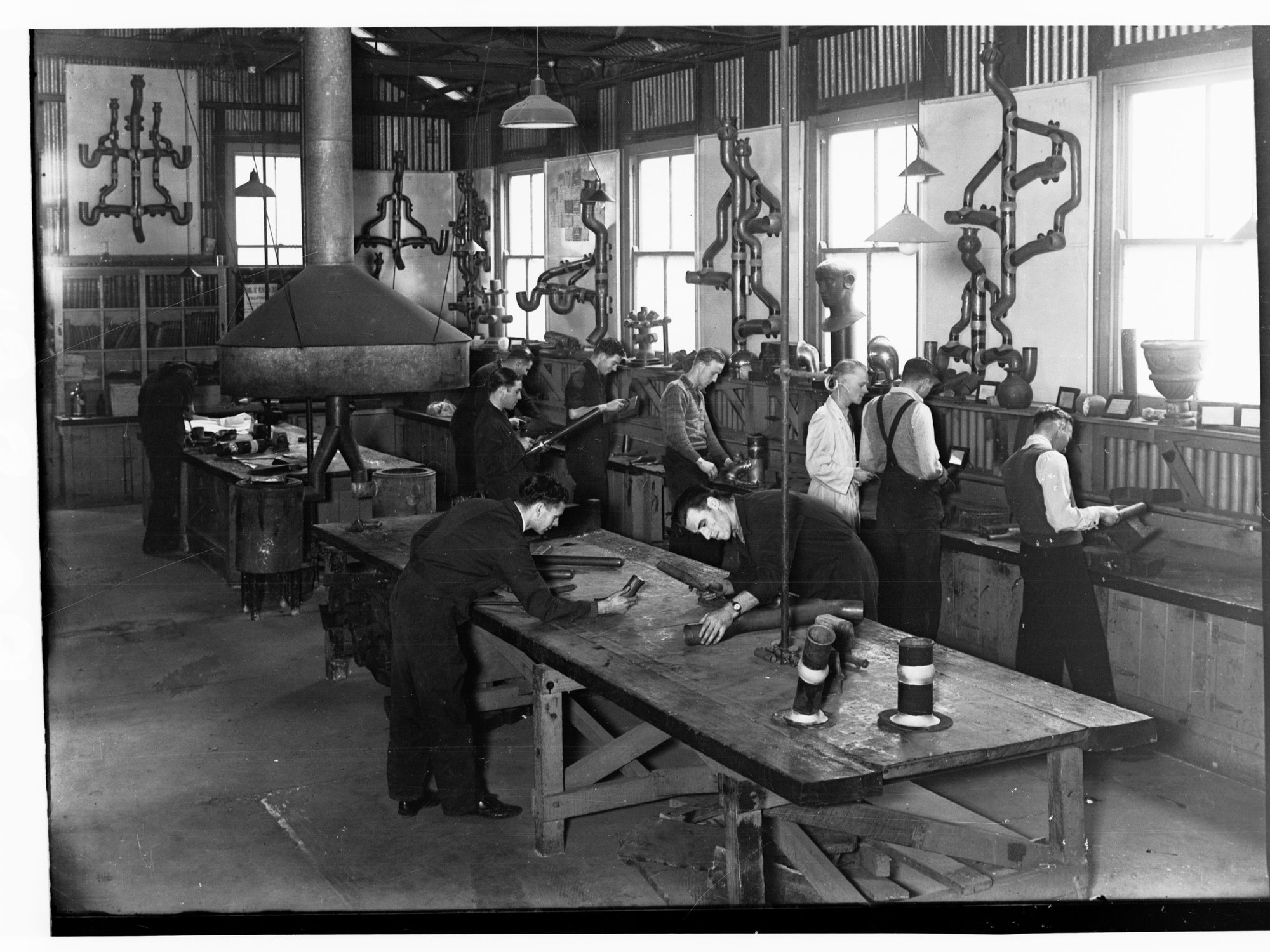 Plumbing students at Trades School