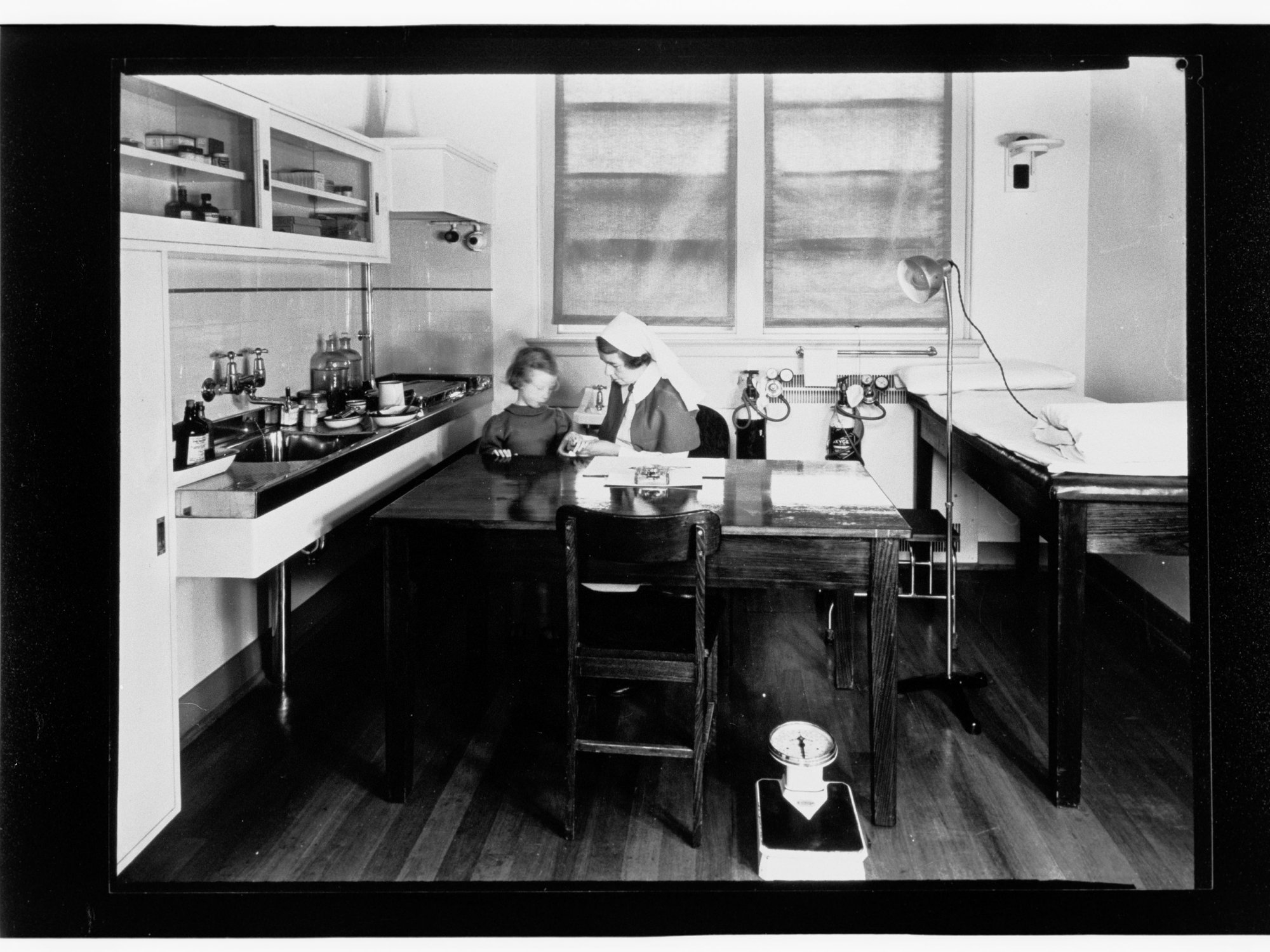 Children's Welfare Department - girl with nurse in medical centre