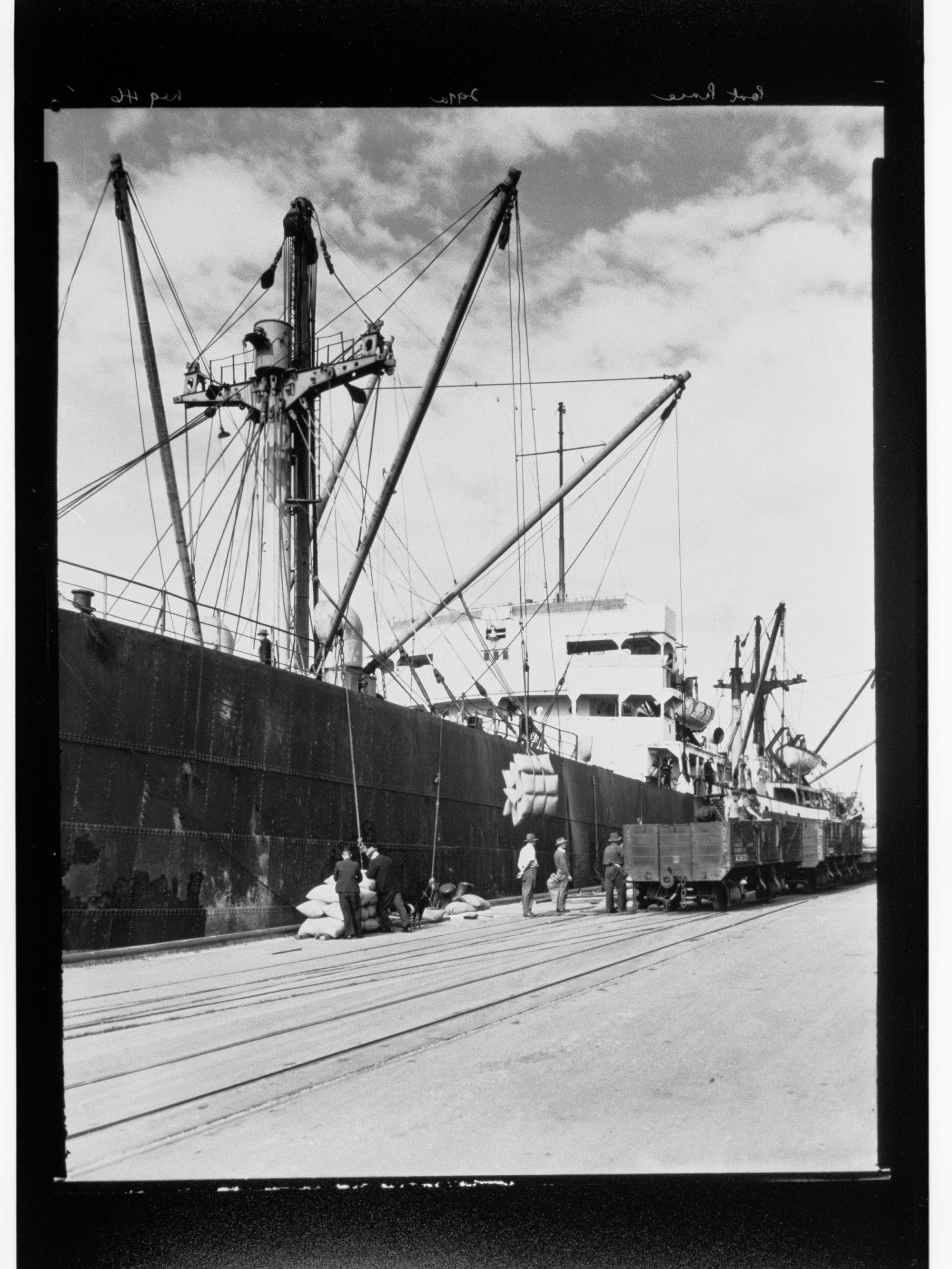 Port Pirie - goods being loaded/unloaded onto ship by crane